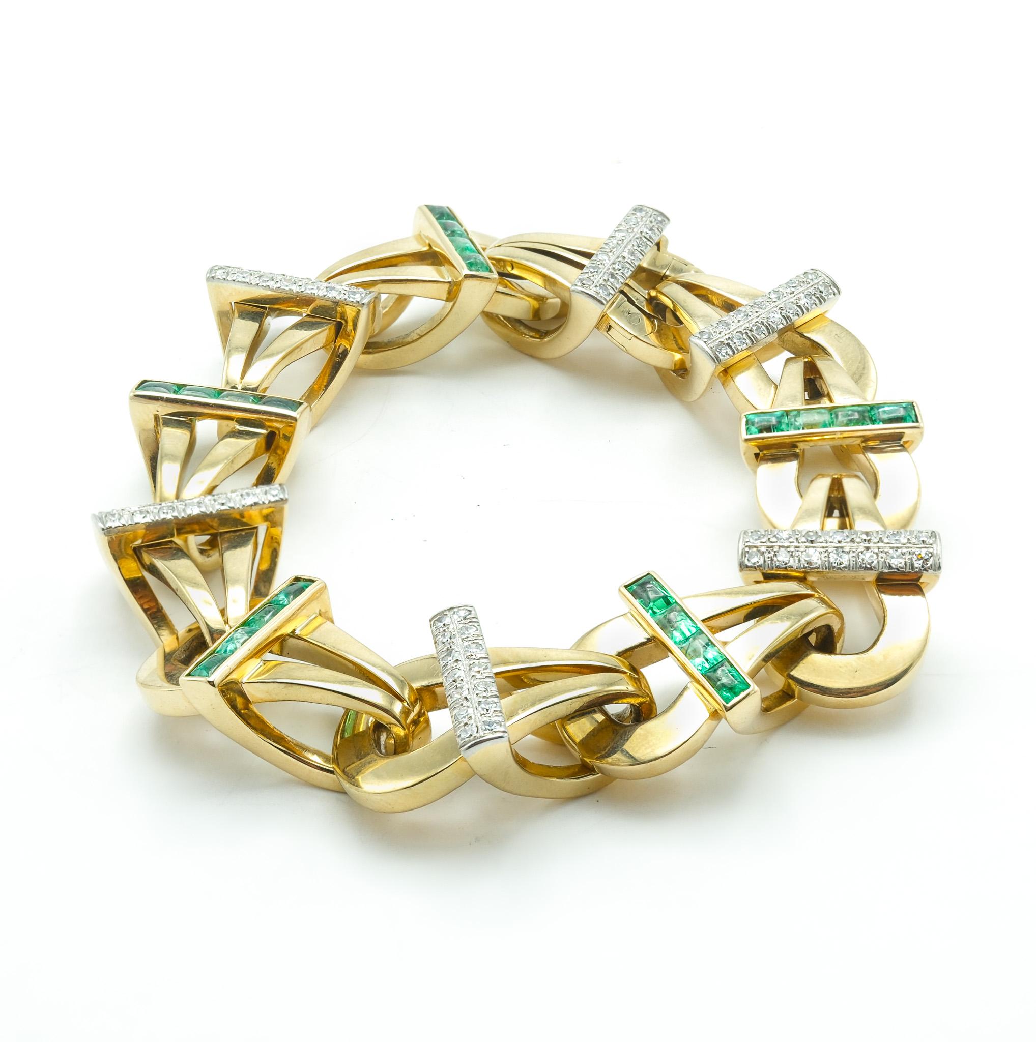 Intricately made with extreme precision - this 14 karat yellow gold fancy link bracelet is a symbol of invite beauty. 

This wearable sculpture is accented with 84 diamonds totaling 1 carat and 20 emeralds totaling 2 carat. What is most special