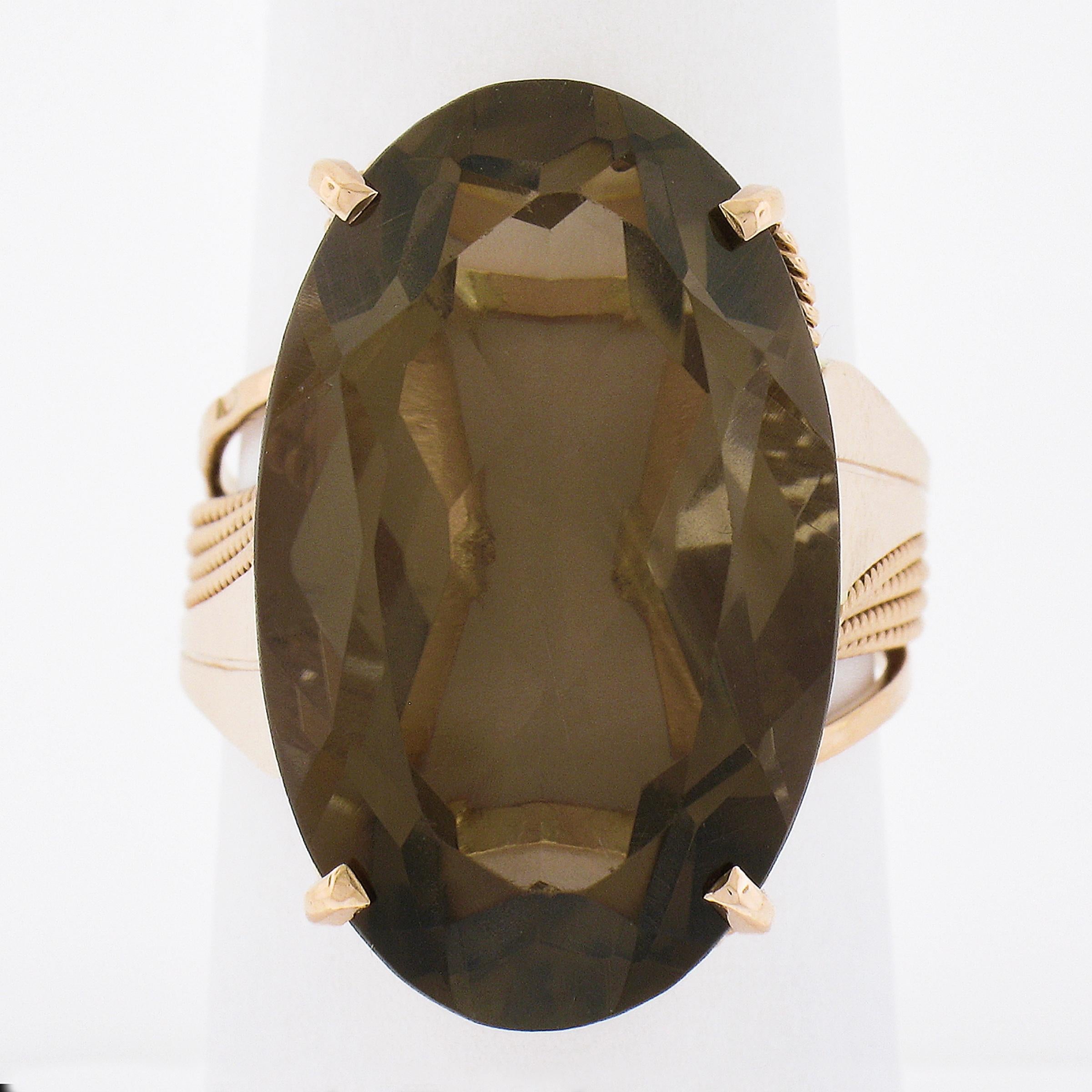 --Stone(s):--
(1) Natural Genuine Smoky Quartz - Oval Cut - Prong Set - Transparent Brown Color - 25.5x15.7mm (approx.)

Material: Solid 14K Rose Gold
Weight: 10.02 Grams
Ring Size: 9.0 (Fitted on a finger. We can custom size this ring - please
