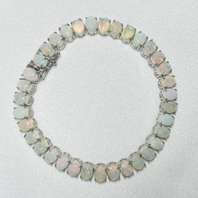 Taille ovale Bracelet tennis en argent sterling 925, fait à la main, avec opale du feu de 16,45 carats en vente