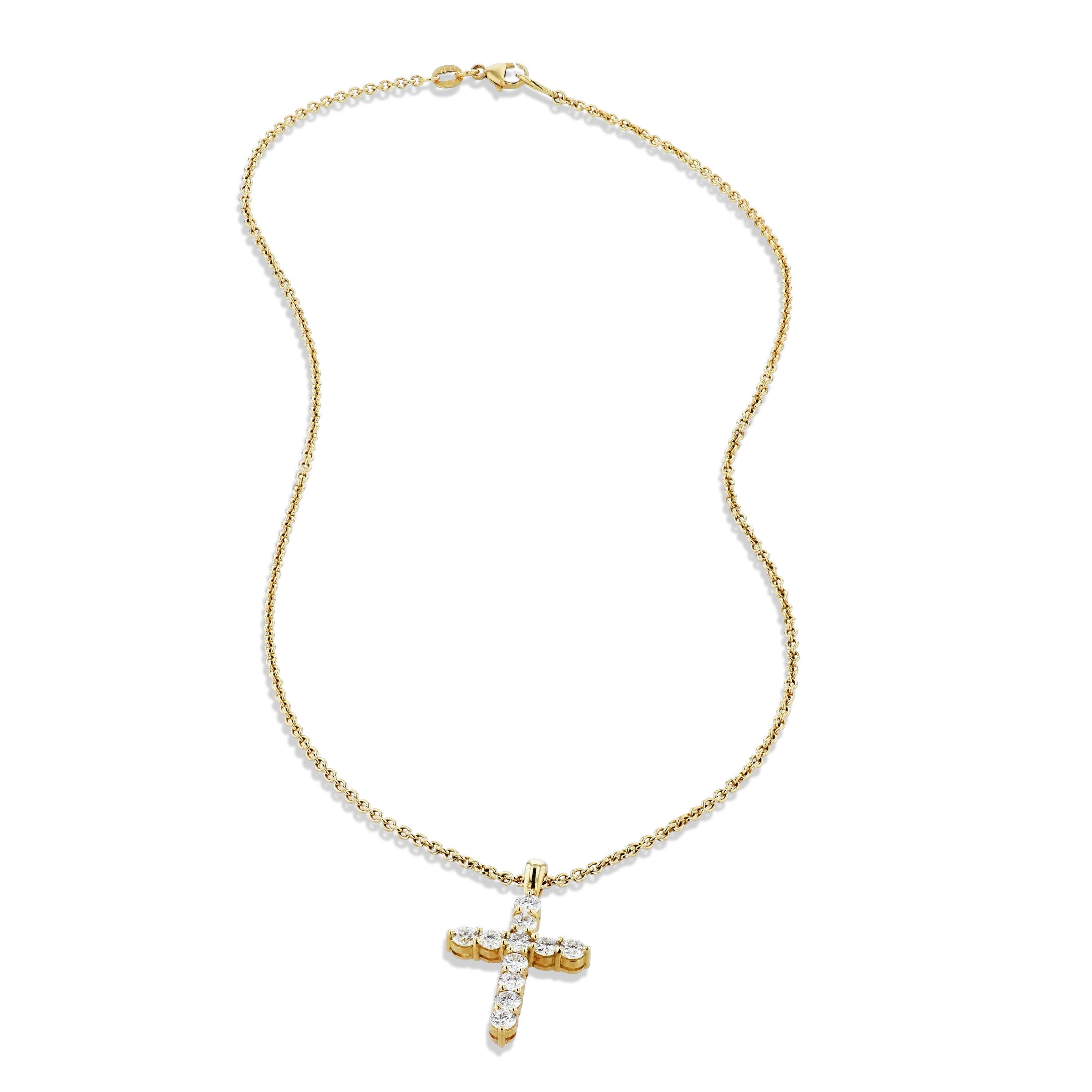 This exquisite Diamond Cross Pendant is handcrafted from 18 karat gold and glistens with diamonds.
This pendant is a 1.68 total carats. The diamonds are F/G in color and VS1 in clarity.
(Necklace not included).

The cross with the bale measures 1.25
