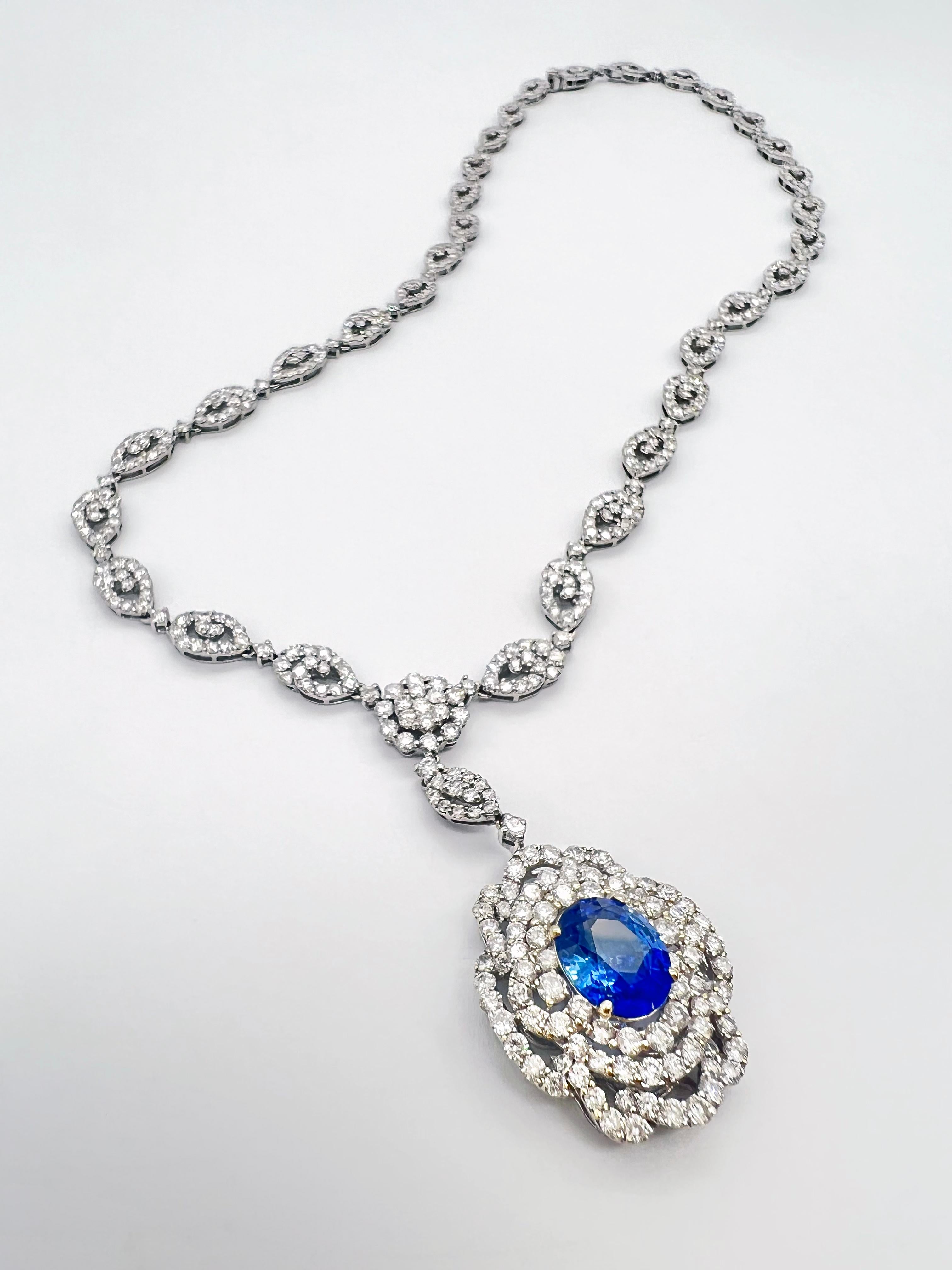 17.17 Total Carat Sapphire and Diamond White Gold Pendant Necklace, GIA Certified

This stunning necklace showcases a single 3.05 Carat Ceylon Sapphire stone known for its durability and its notion of eternality. The sapphire and diamonds are set in