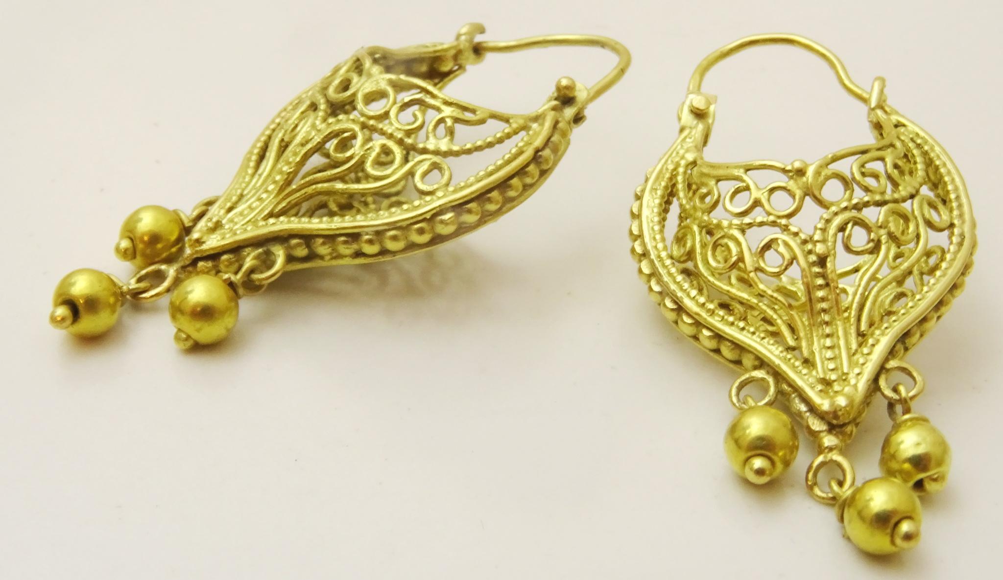 One of the masterpieces from our Jerusalem workshop , the basic concept of the earring comes from the Byzantine early Islamic earrings which were called the Basket of Plenty earrings , those that wore these earrings felt that they had room for