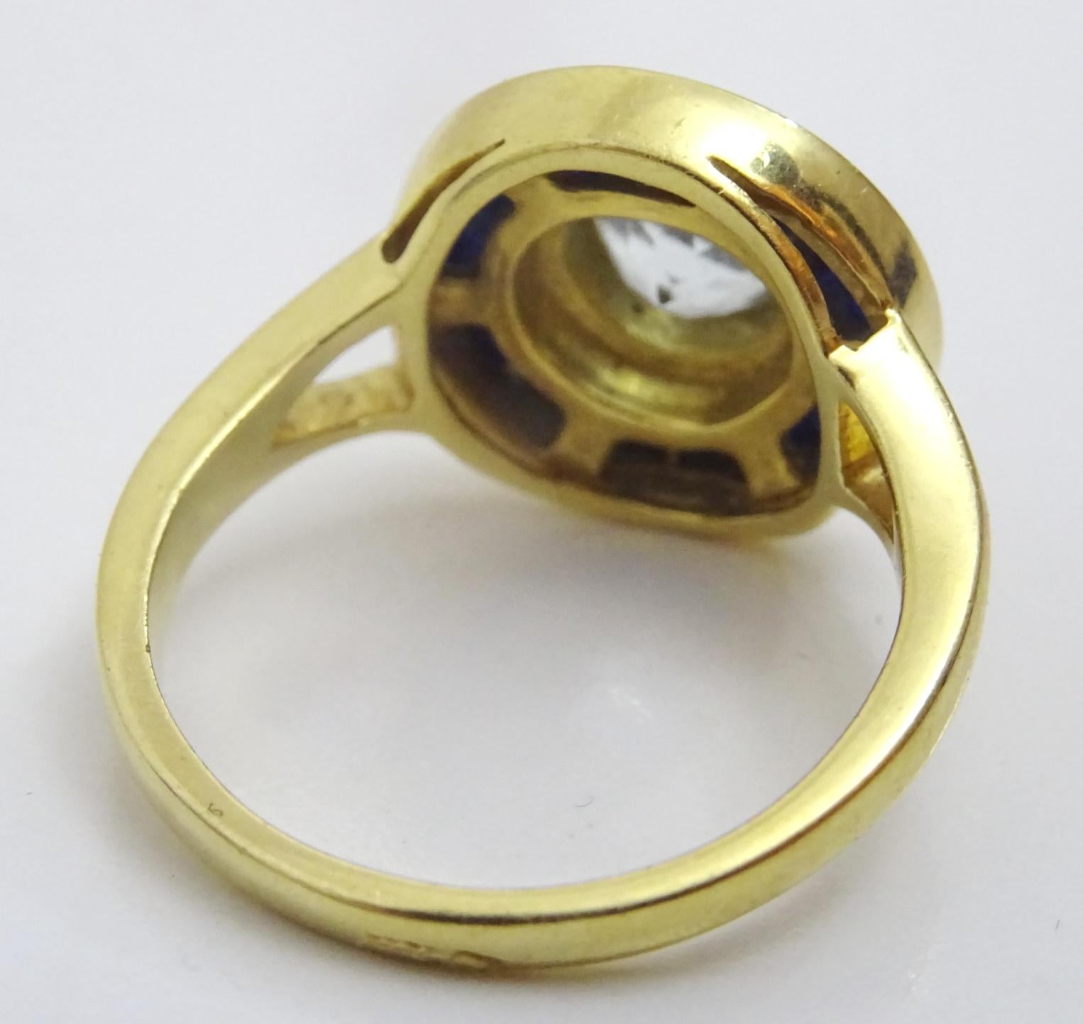 Artist Handmade 18 karat Gold Aquamarine and Sapphire Ring For Sale