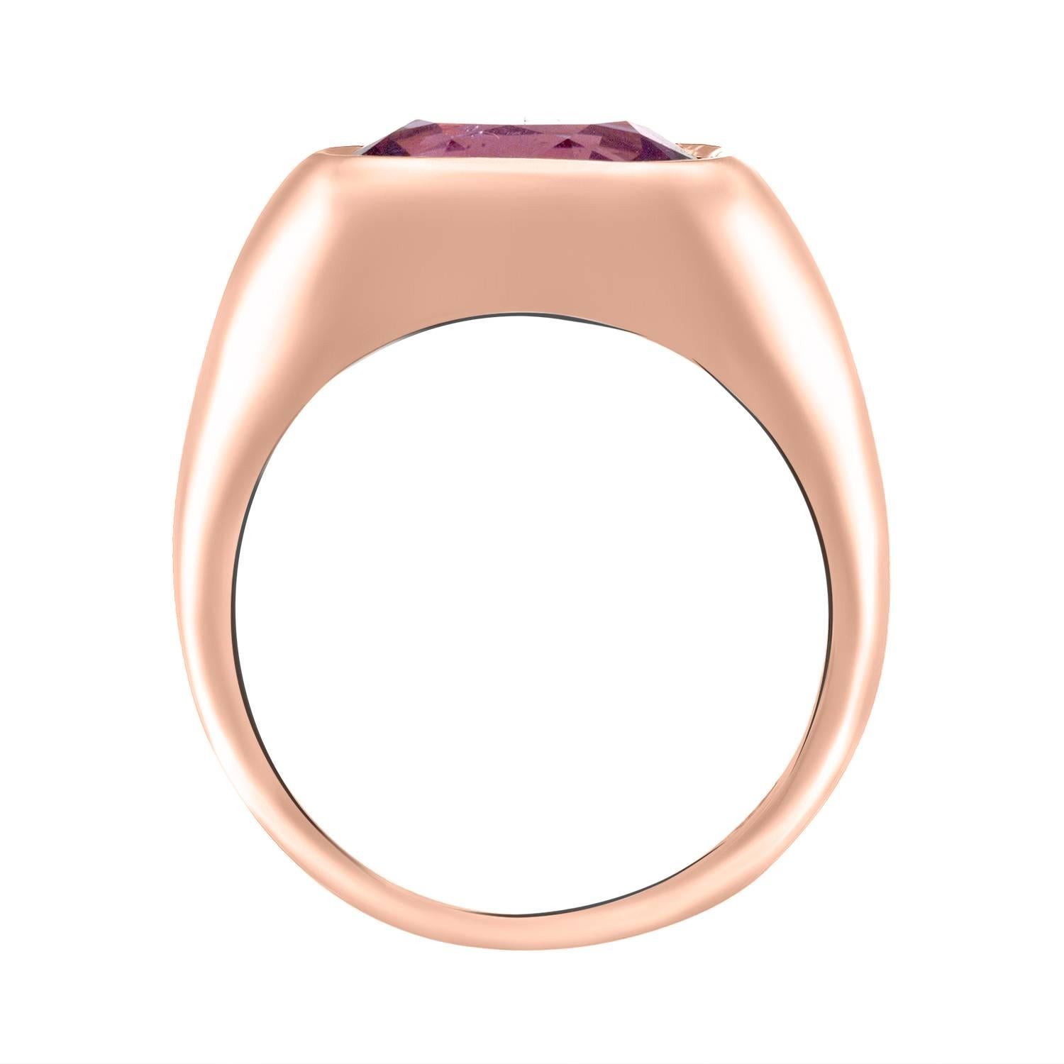 Shah & Shah's handmade 18 karat rose gold bezel ring with a 3.0 carat oval purple sapphire. 

The ring is a size 6. Initial sizing is complimentary and an insurance appraisal is included with your purchase.