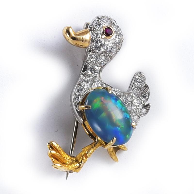 Original Duck brooch, made in 1980's, with a opal doublet, 29 diamonds 1.10 carats circa and 1 ruby.