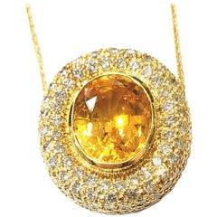 Handmade 18 Karat Yellow Gold and Diamond Pendant with a Center Yellow Sapphire