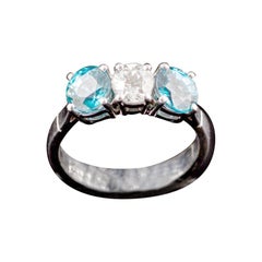 Handmade 18 Kt White Gold Ring with Natural Zircons and 0.77 Ct Diamond