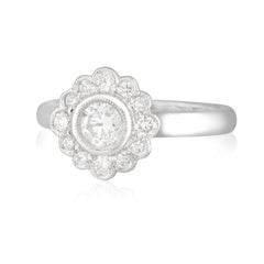 Handmade 18ct White Gold Daisy Style Diamond Halo Engagement Ring, TDW 0.72ct.