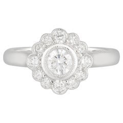 Handmade 18ct White Gold Daisy Style Diamond Halo Engagement Ring, TDW 0.72ct.