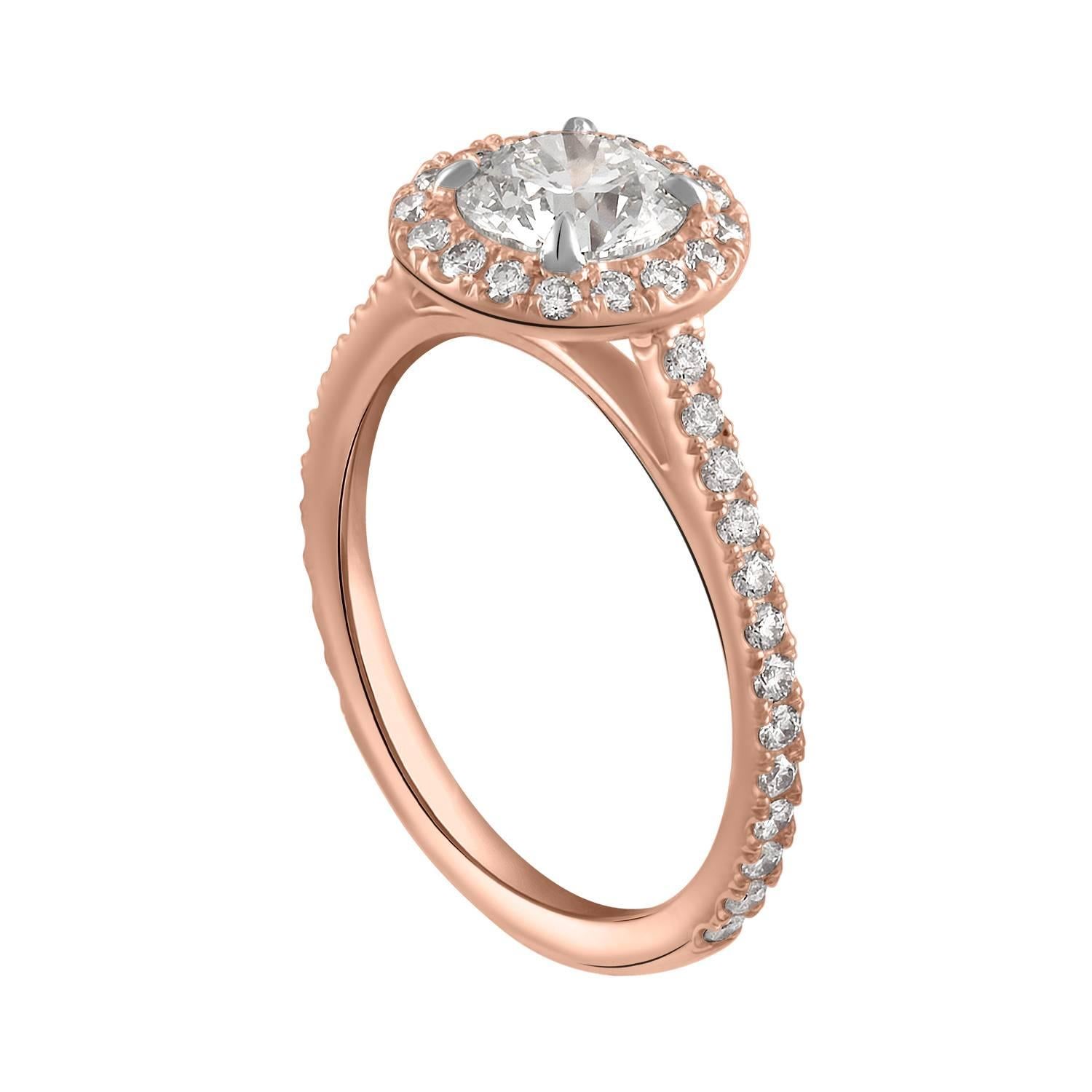 Shah & Shah's handmade 18k rose gold, platinum, and 0.90ct G/VS1 GIA certified round brilliant cut diamond set in a delicate micropave surround with 0.42cts of 1.3mm round brilliant cut diamonds. Part of our 