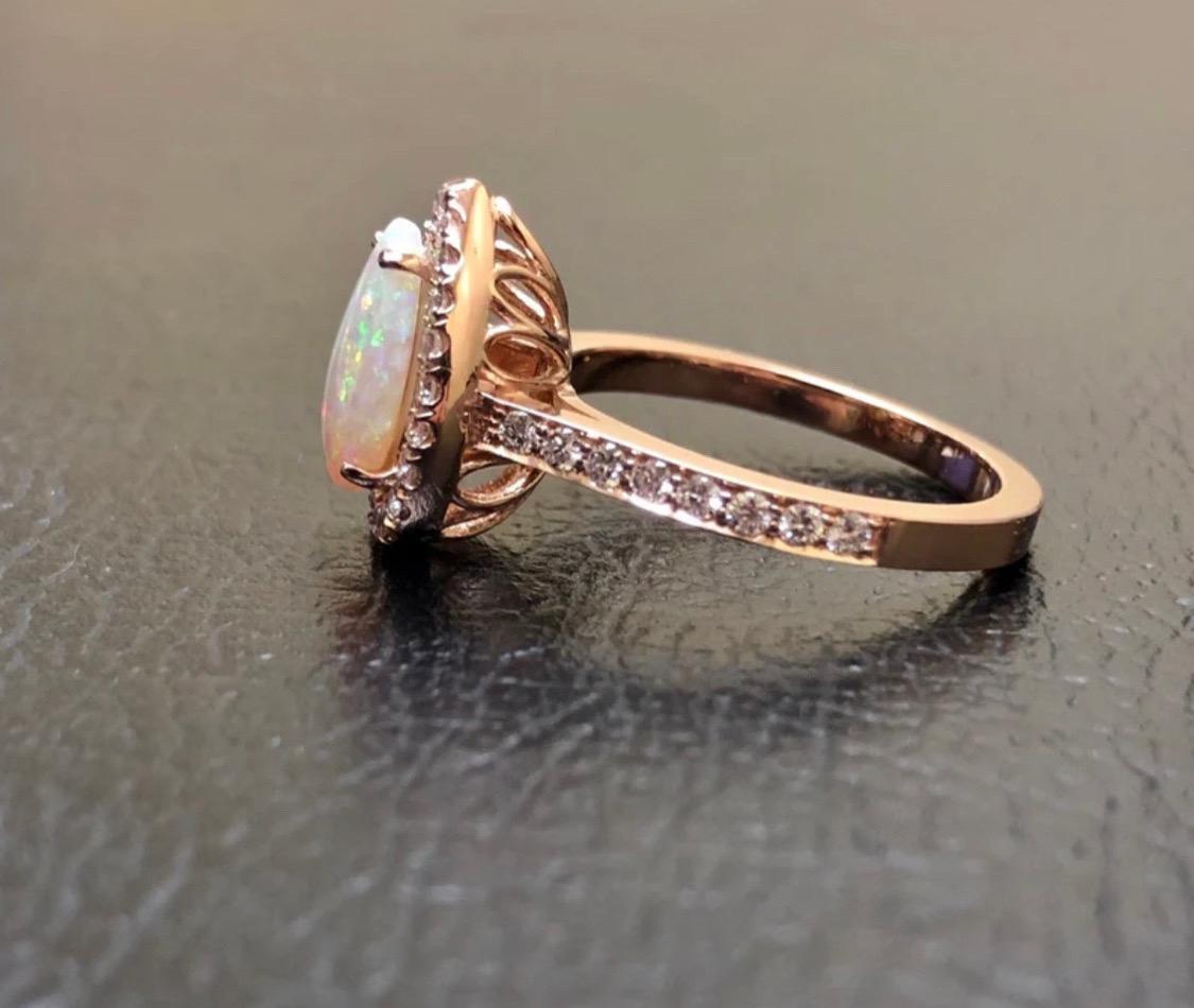 Handmade 18K Rose Gold Halo Diamond Australian Pear Shape Opal Engagement Ring For Sale 5