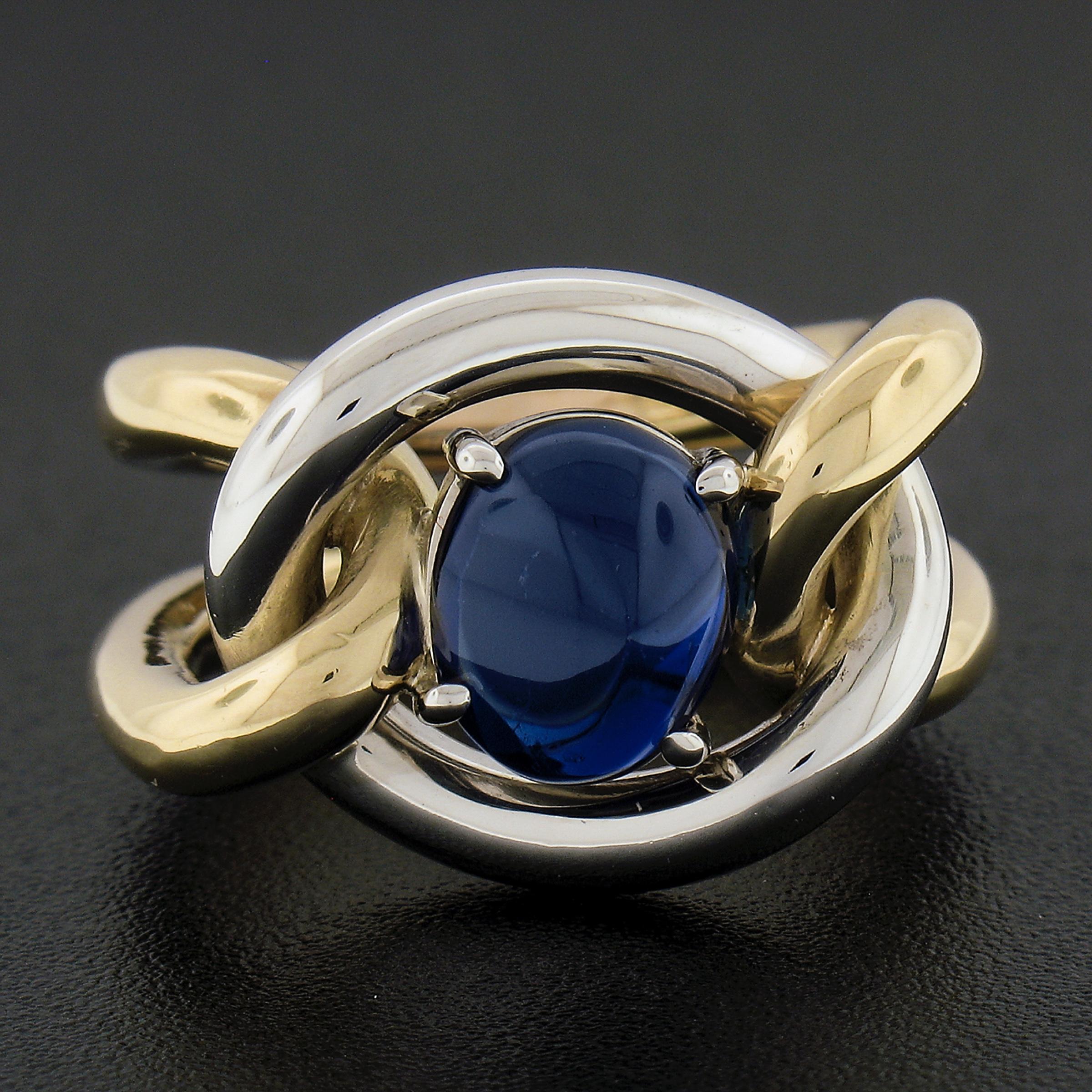 Oval Cut Handmade 18K TT Gold GIA No Heat Oval Cabochon Blue Sapphire Knot Cocktail Ring For Sale