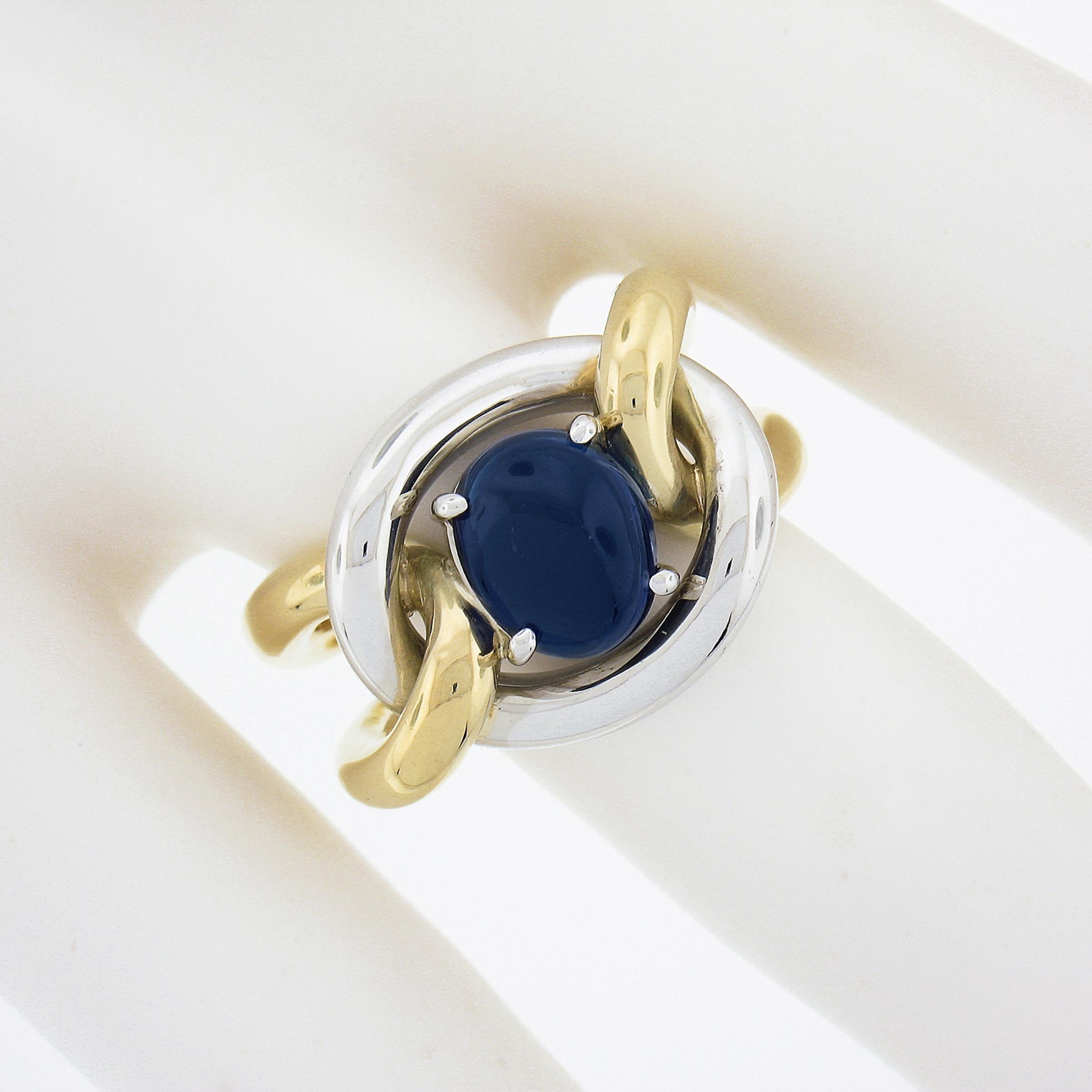 Handmade 18K TT Gold GIA No Heat Oval Cabochon Blue Sapphire Knot Cocktail Ring In Excellent Condition For Sale In Montclair, NJ