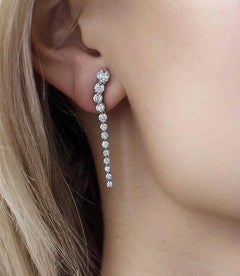 Handmade 18 Karat White Gold and 2.27 Carat Graduating Diamond Earrings