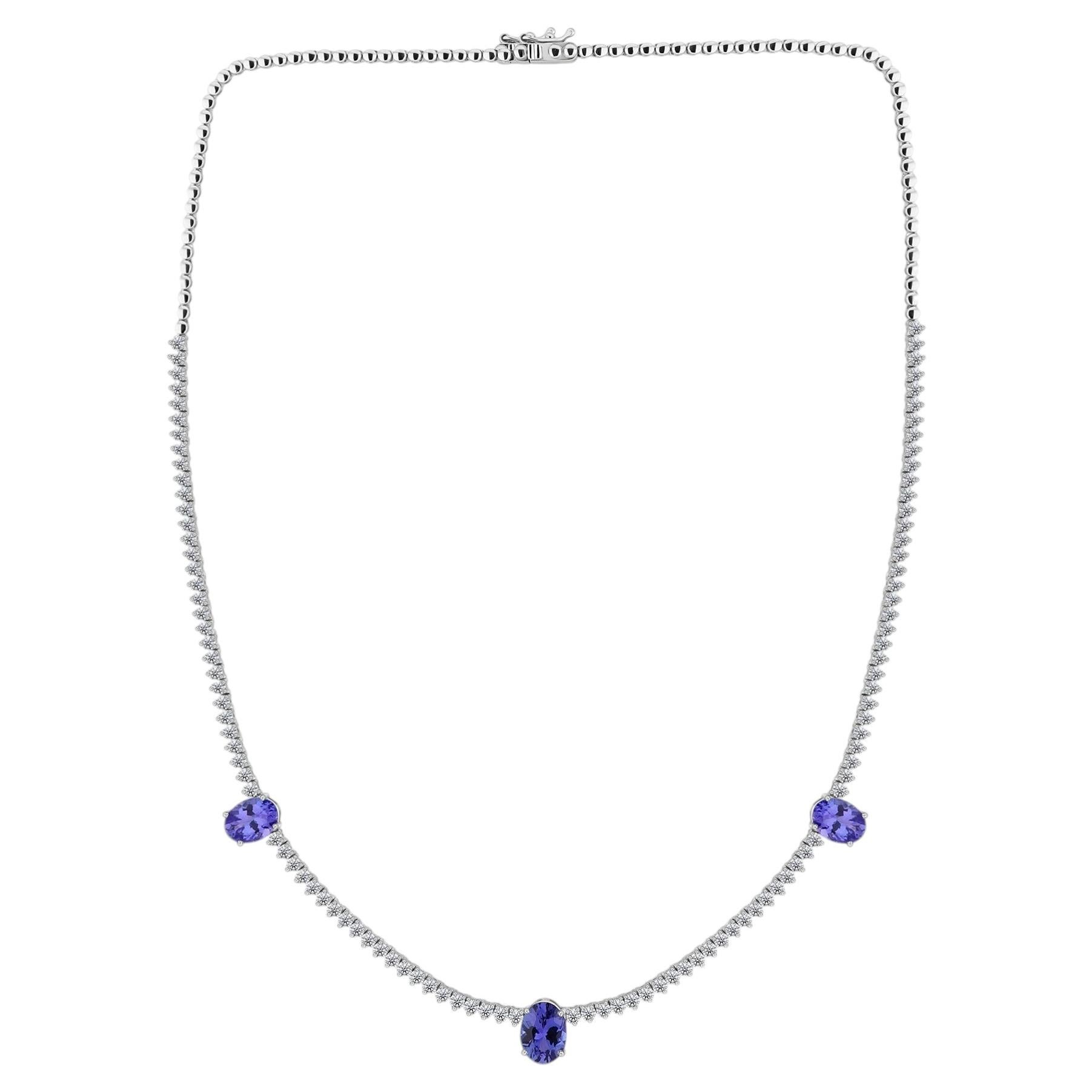 Collier en or blanc 18 carats avec une tanzanite naturelle de 3,85 carats et un diamant de 3,17 carats