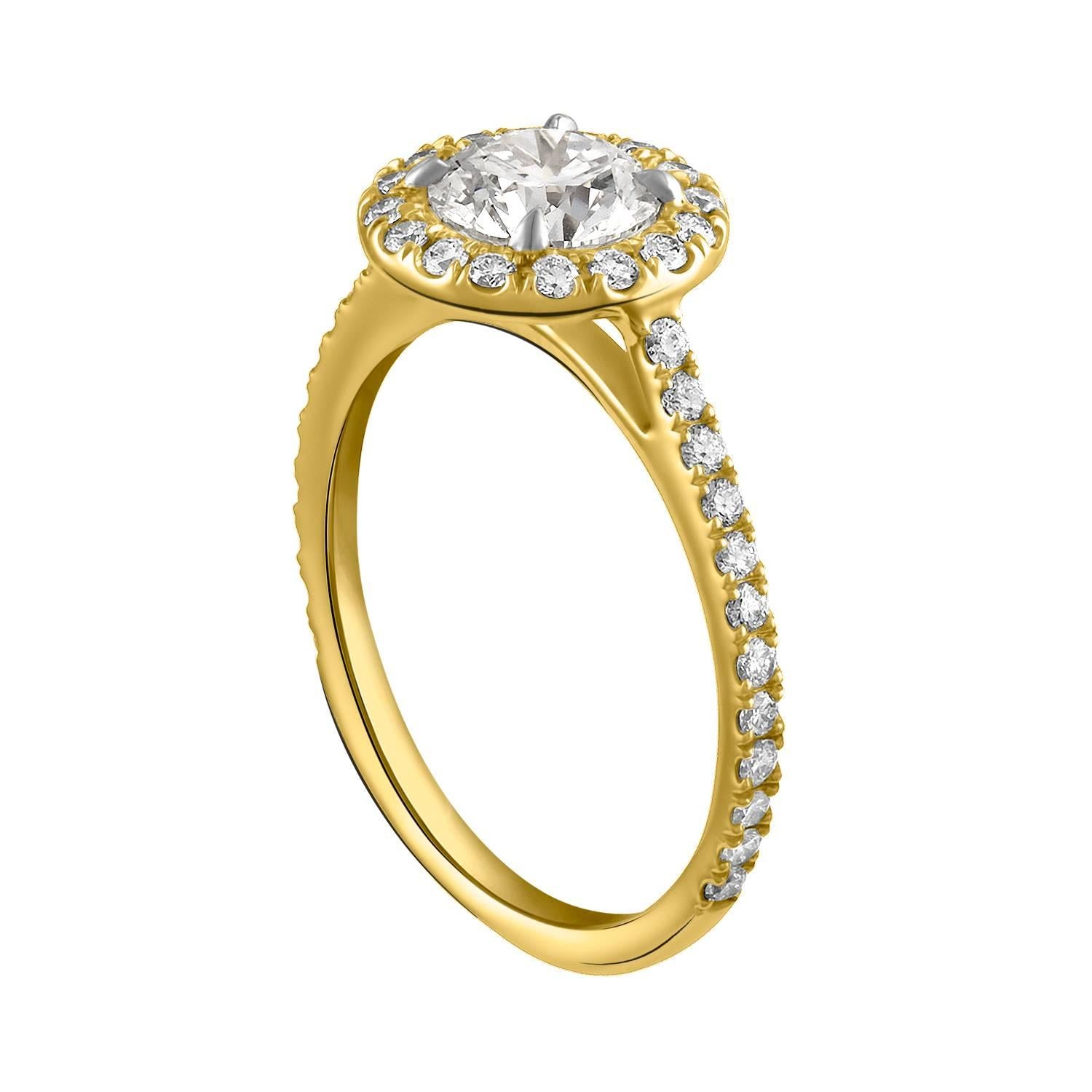 Shah & Shah's handmade 18k yellow gold, platinum, and 0.90ct H/VVS1 GIA certified round brilliant cut diamond set in a delicate micropave surround with 0.40cts of 1.3mm colorless round brilliant cut diamonds. Part of our signature 