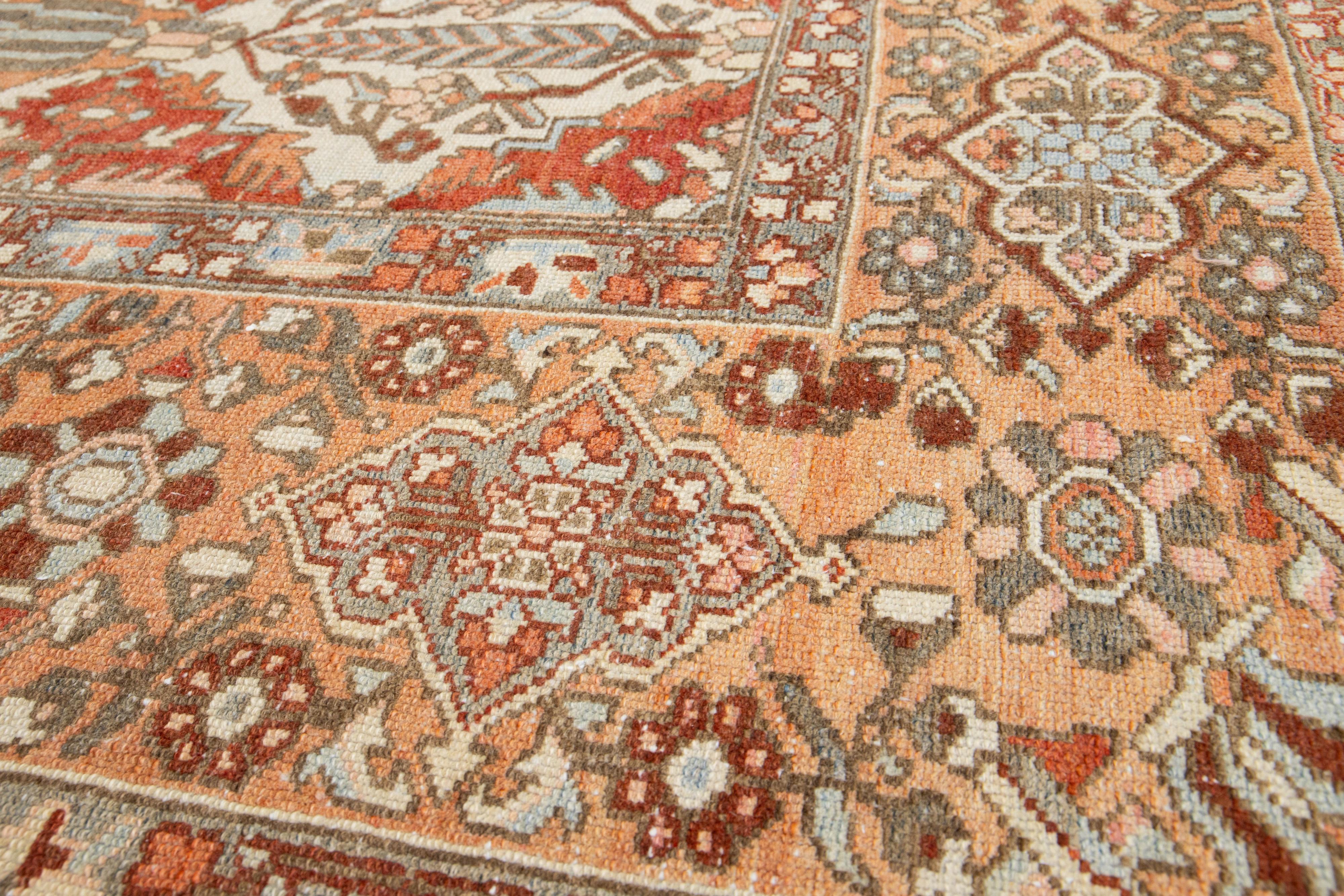 Islamic Handmade 1920s Persian Bakhtiari Wool Rug with Floral Motif In Orange  For Sale
