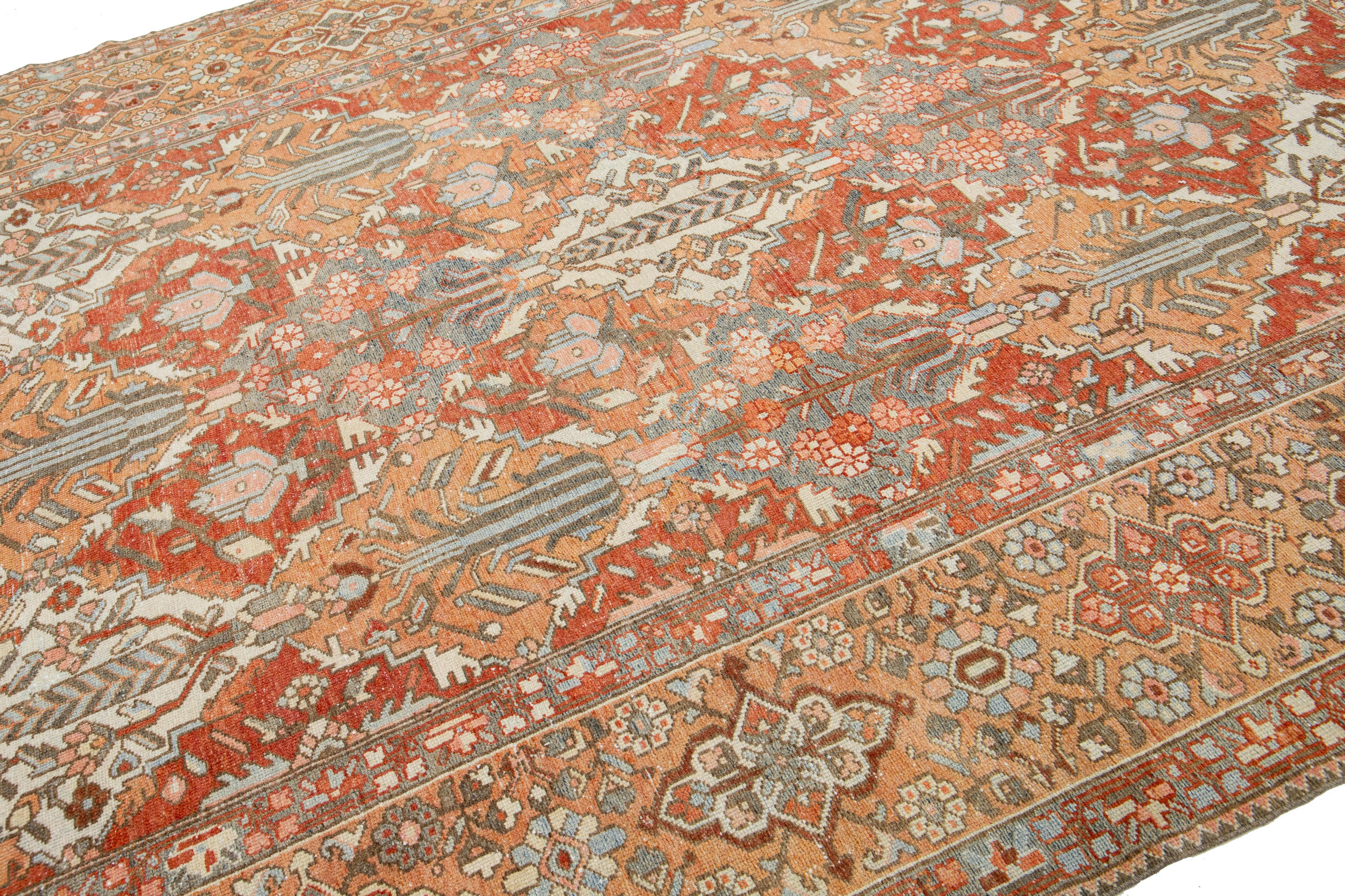 Hand-Knotted Handmade 1920s Persian Bakhtiari Wool Rug with Floral Motif In Orange  For Sale