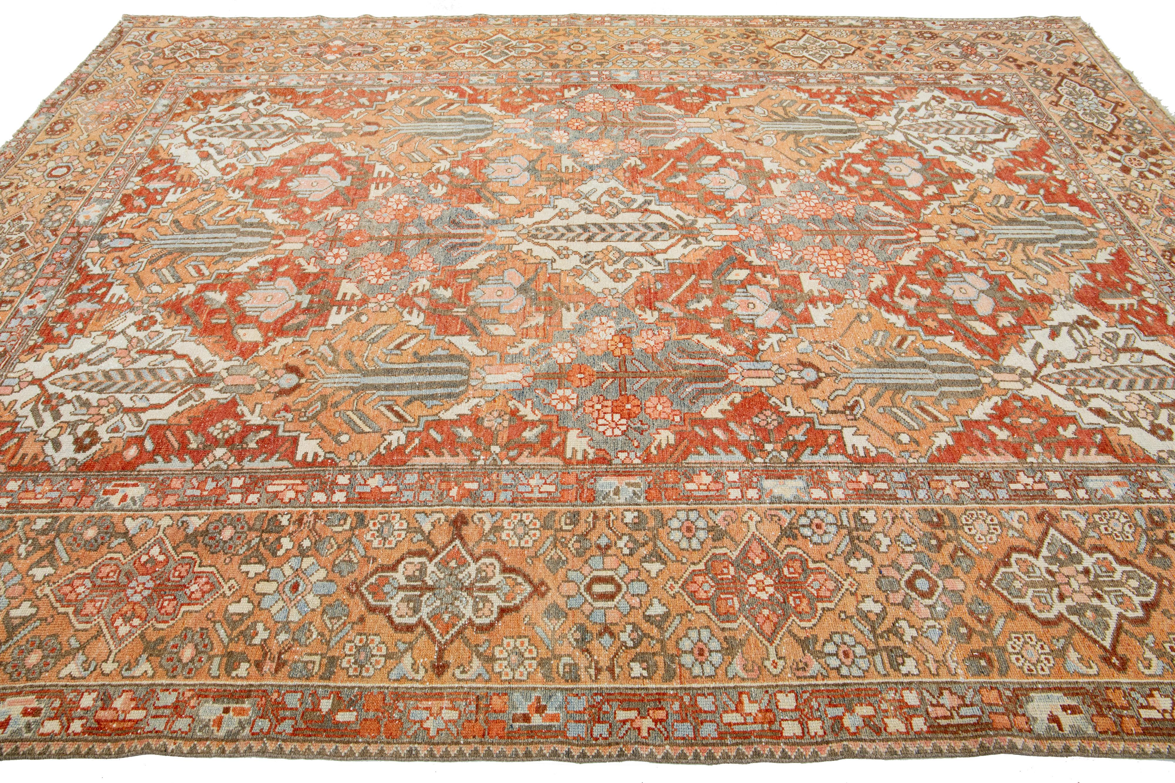 Handmade 1920s Persian Bakhtiari Wool Rug with Floral Motif In Orange  In Good Condition For Sale In Norwalk, CT
