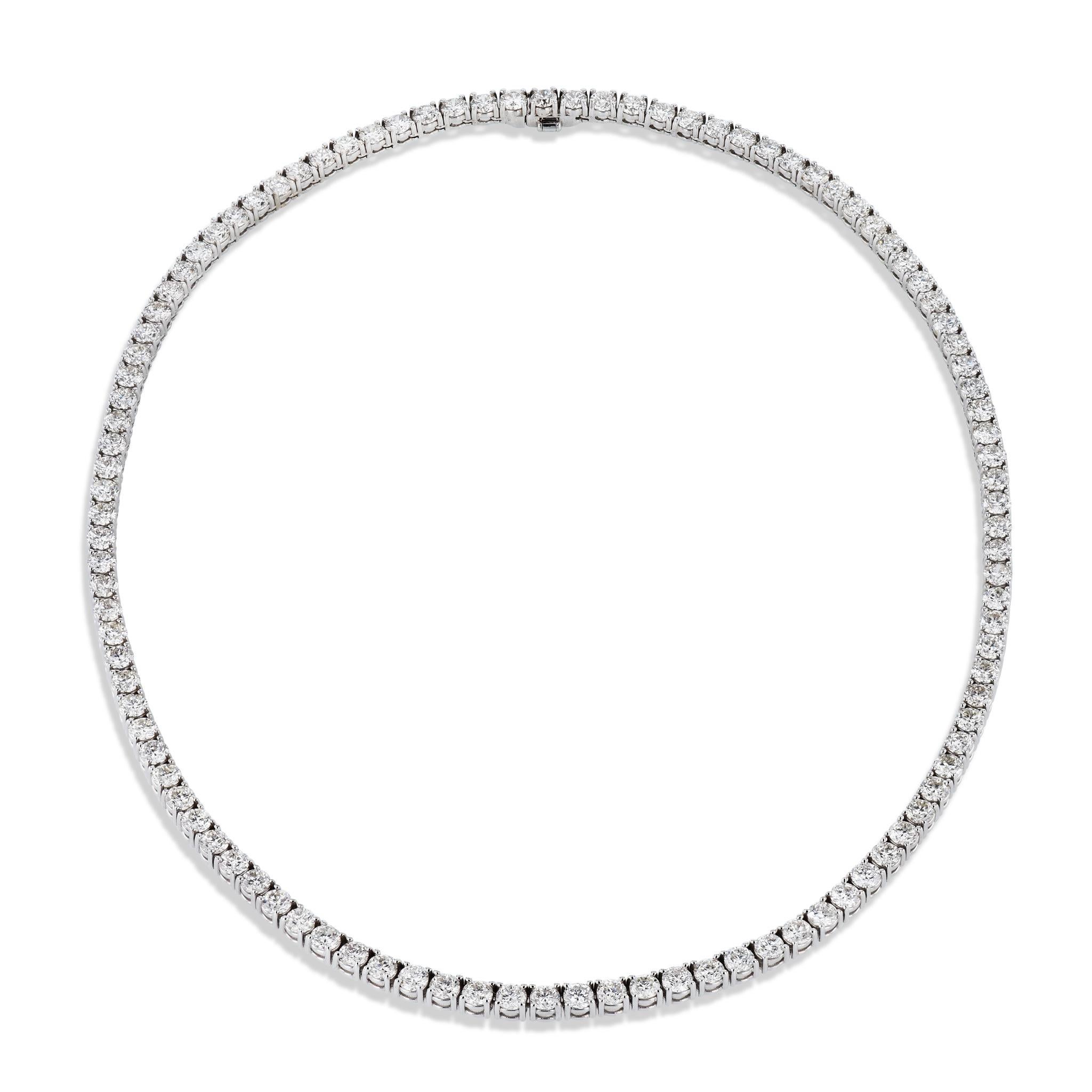 Experience elegance and class with this handmade 18 karat White Gold Diamond Tennis Necklace. Showcasing 105 diamonds weighing almost 20 carats! The sparking diamonds are artfully arranged in a straight line, you'll be sure to turn heads. 

This