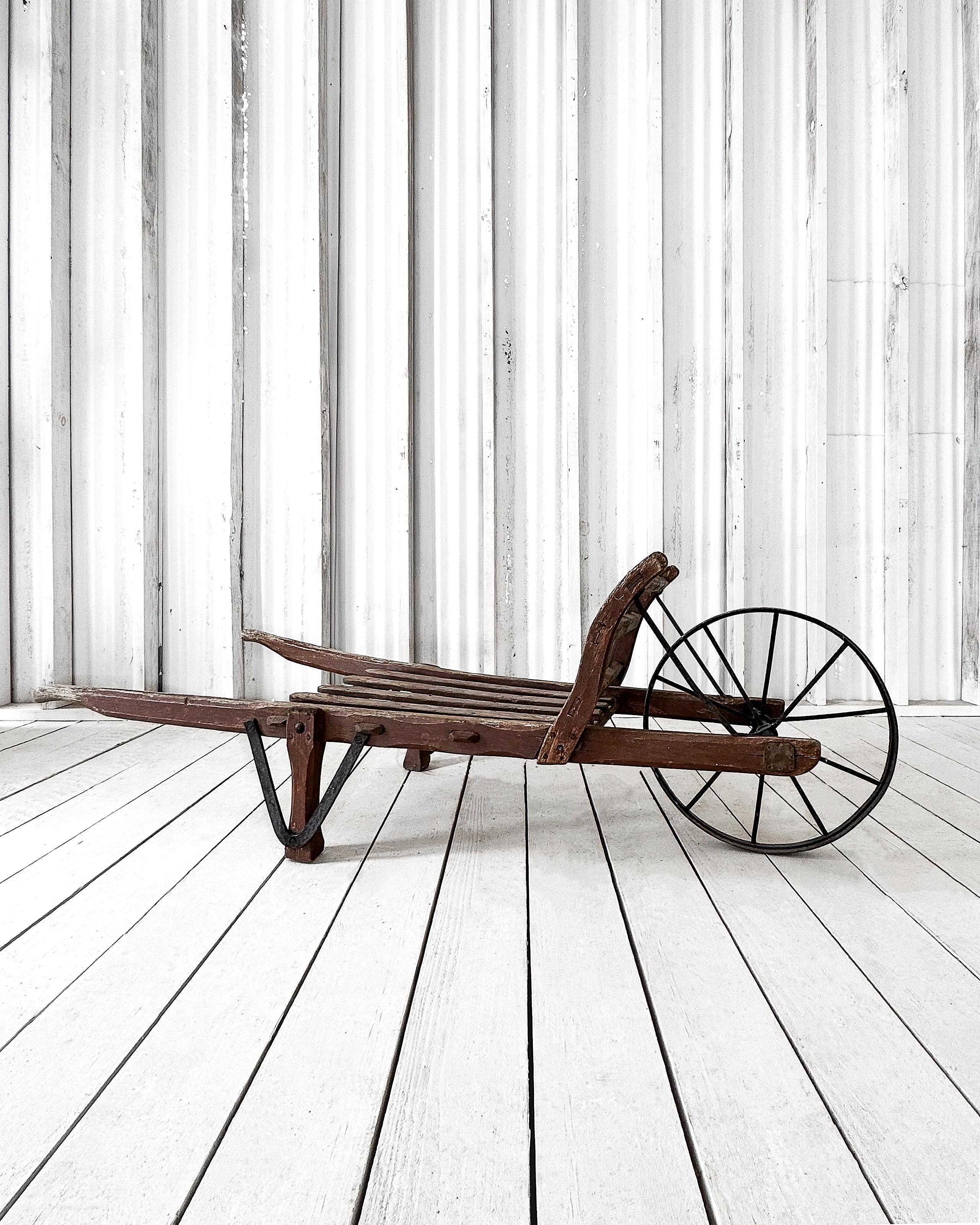 Handmade 19th Century French Rustic Wooden Slat Wheelbarrow In Good Condition For Sale In Mckinney, TX