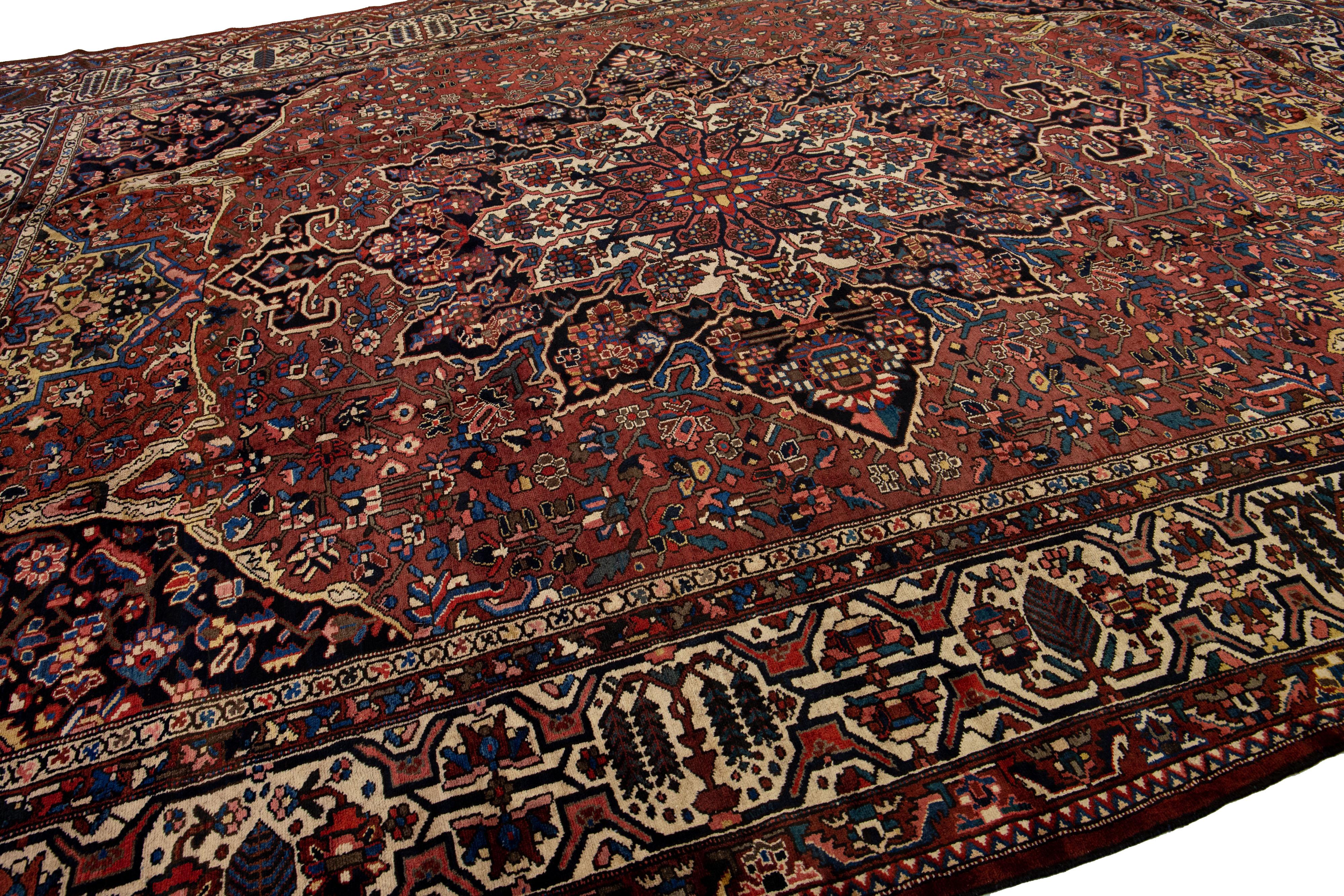 Hand-Knotted Handmade 20th Century Red Persian Bakhtiari Wool Rug With Allover Motif For Sale