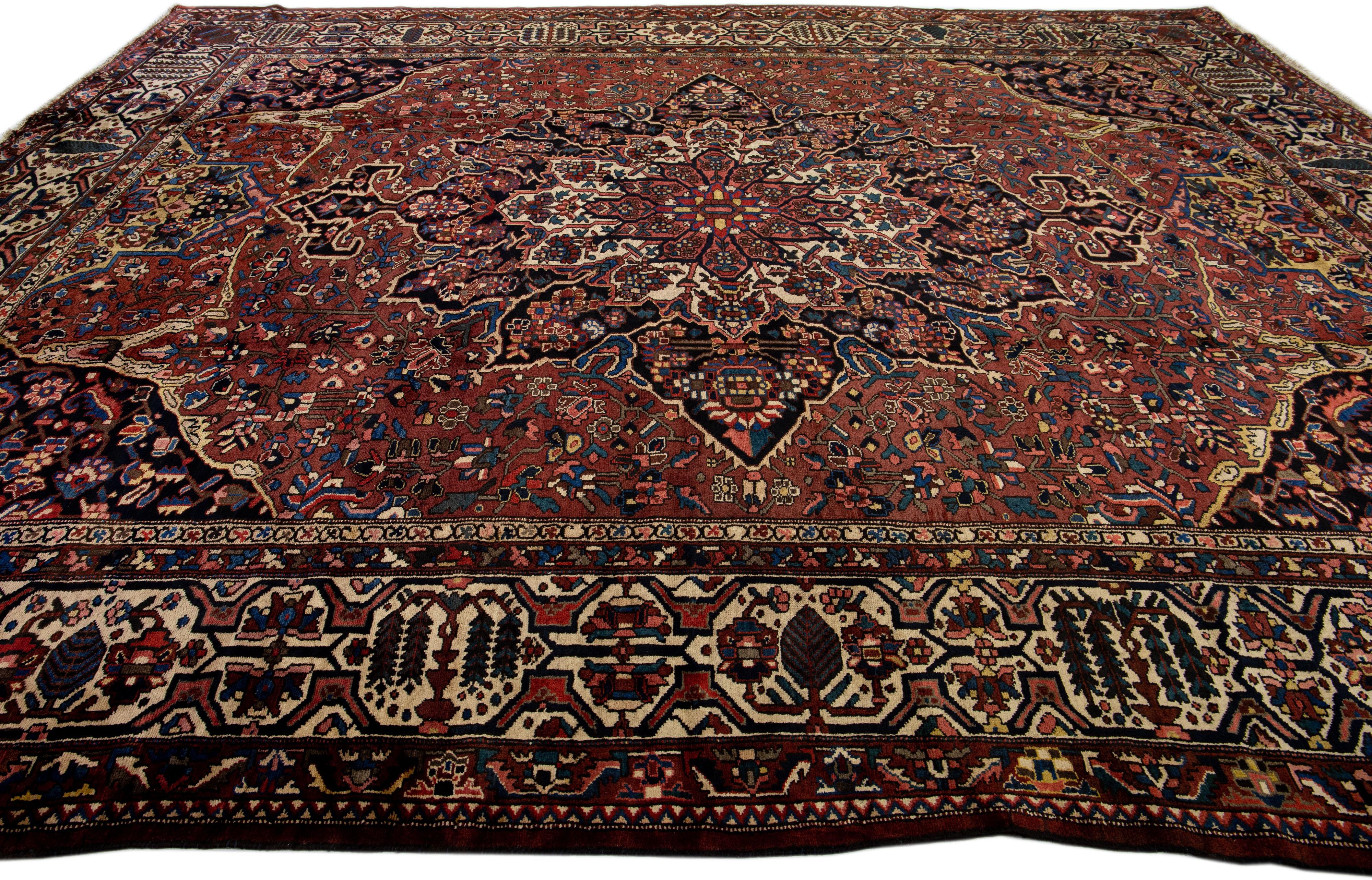 Handmade 20th Century Red Persian Bakhtiari Wool Rug With Allover Motif In Good Condition For Sale In Norwalk, CT