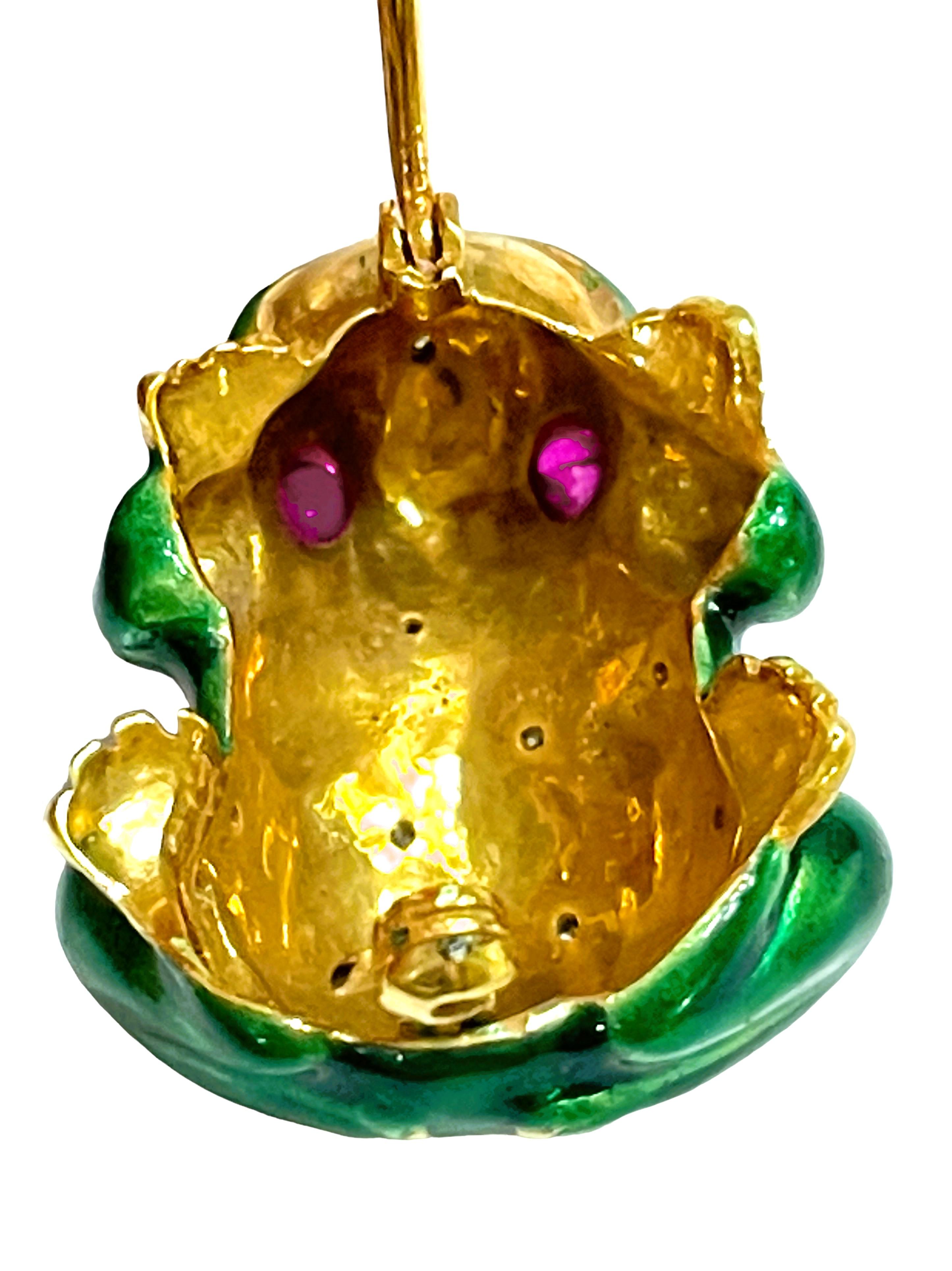 What stunning pendant brooch in 21K Yellow Gold.  It is pre-owned but in new condition.  It is just the cutest little guy!  I couldn't find a Maker's mark but it's much like David Webb's creations. It comes with an appraisal.  It has 2 ruby cabochon