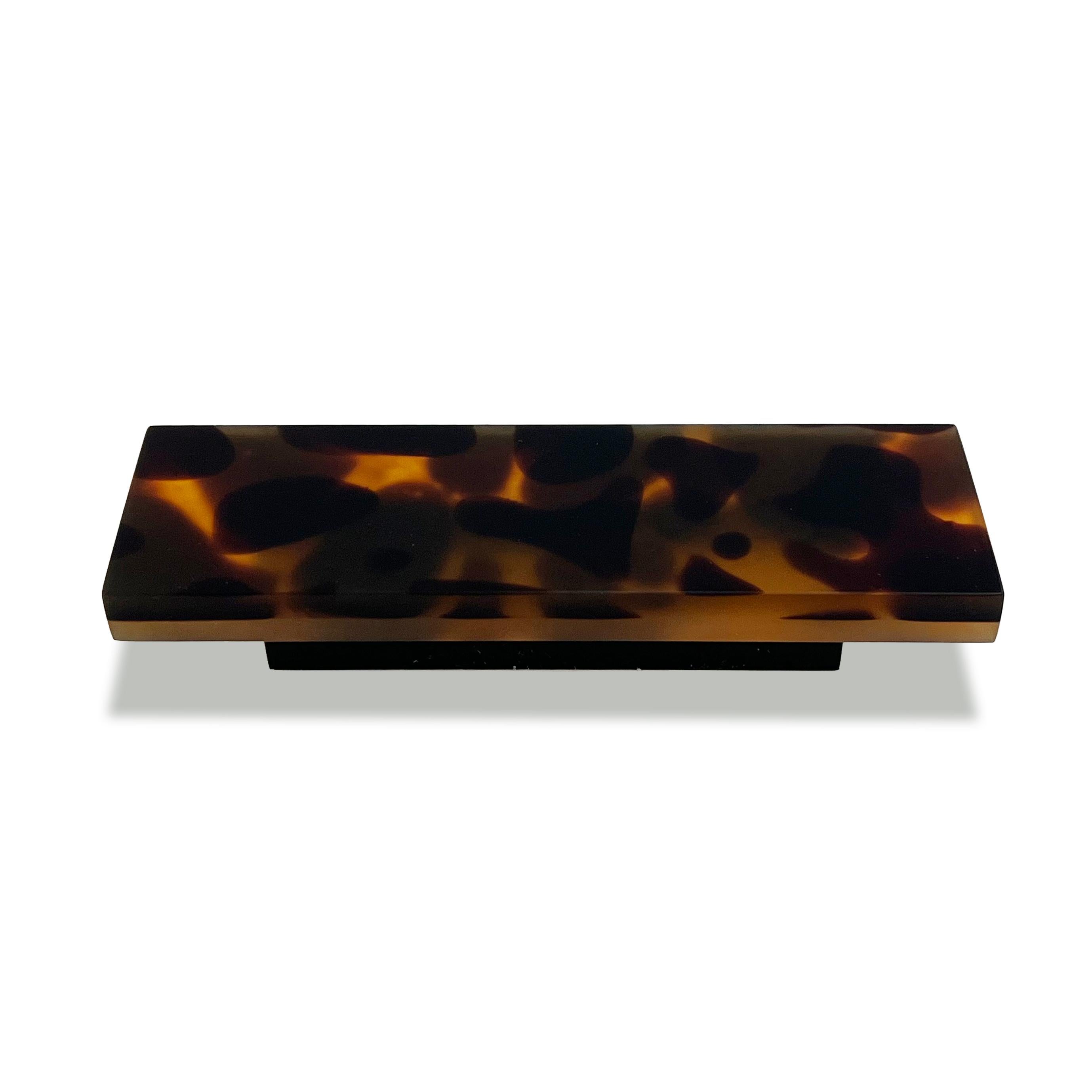 Our signature experimental resin casting is now available as hardware for any cabinet, drawer, or door.  Each resin piece we make is non-repeating and completely individual. We have intentionally designed every process we use — from how we mix our