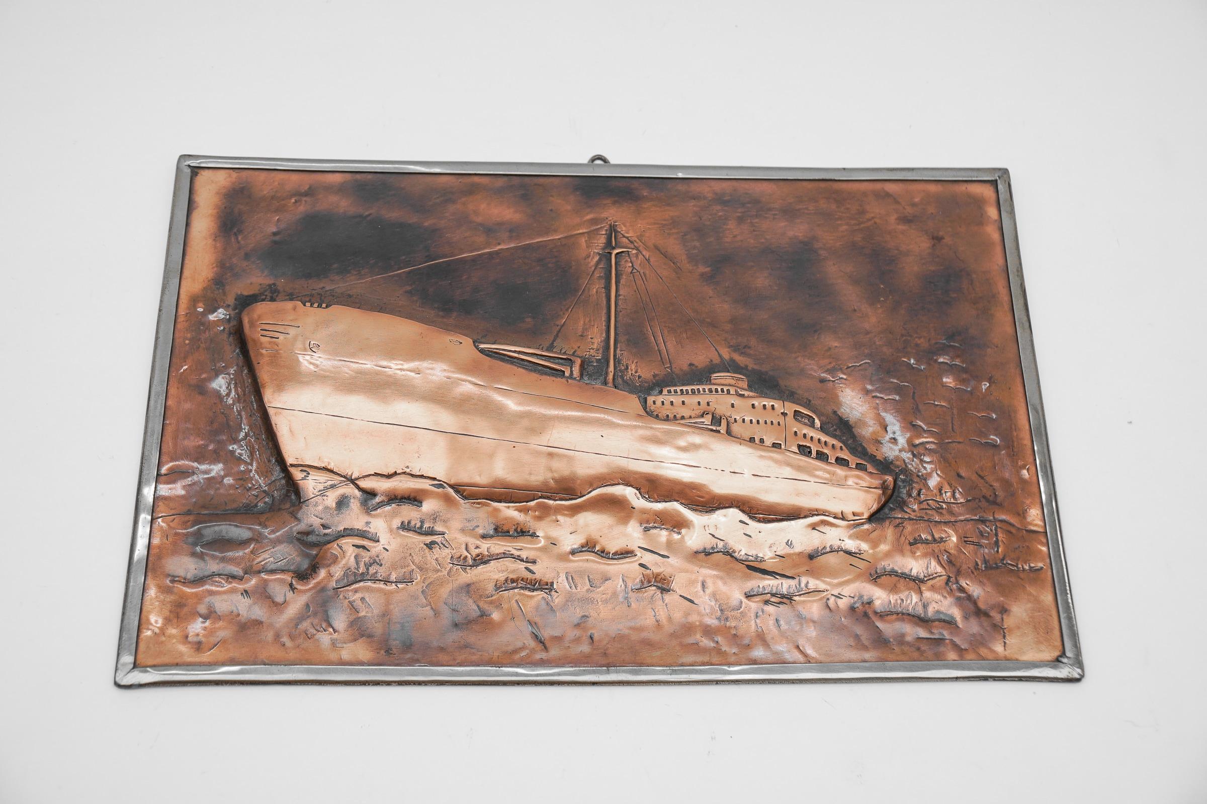 Handmade 3D copper and brass relief mural of a ship, 1950s.

The image rises about 2cm, is proportionally perfect and is very decorative. 