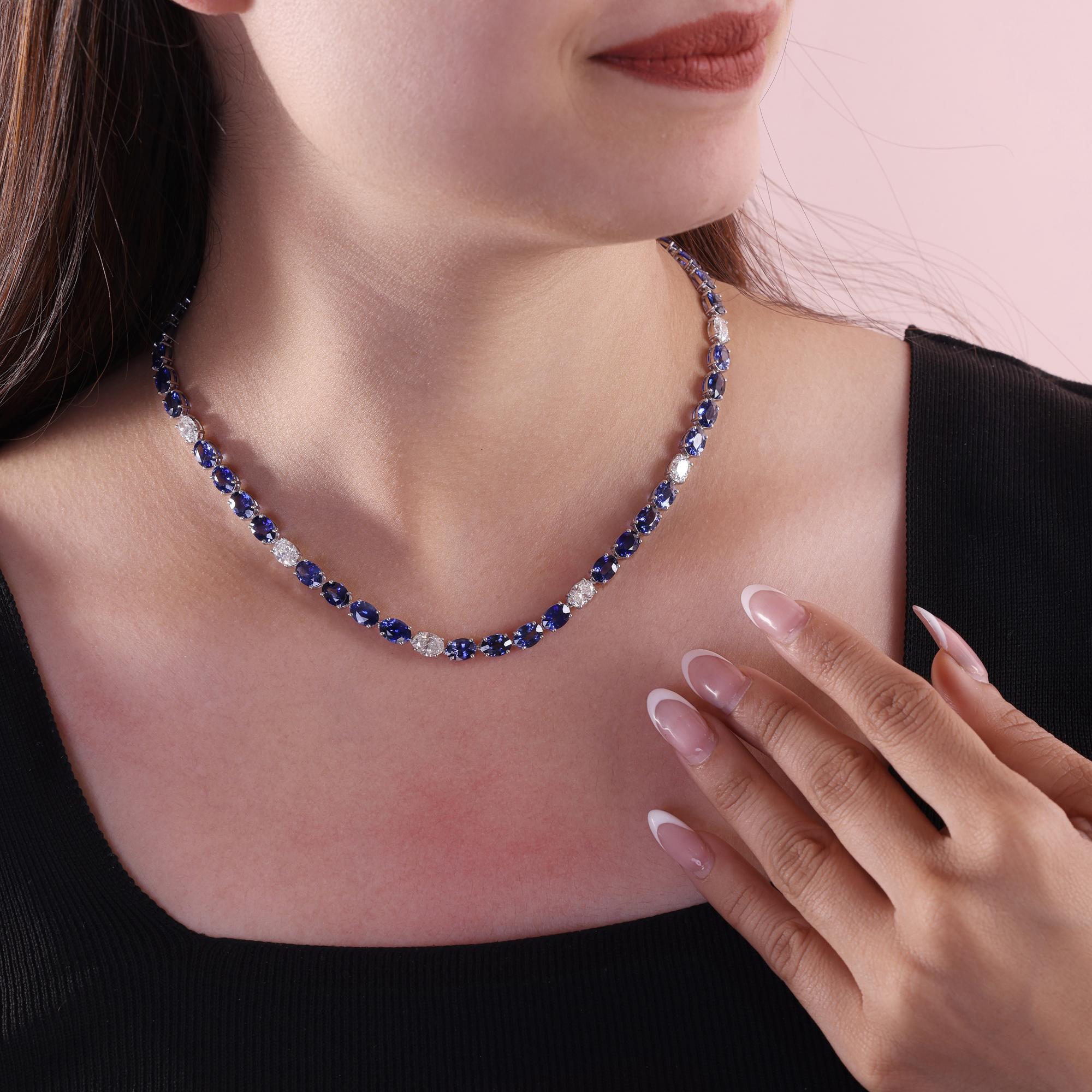 Collier de tennis en or blanc 18K fait main 42,07 TCW saphir bleu et diamant 
Ce collier époustouflant de saphirs bleus taillés en ovale et de diamants a été conçu pour incarner le luxe intemporel et la sophistication moderne. Le design présente une