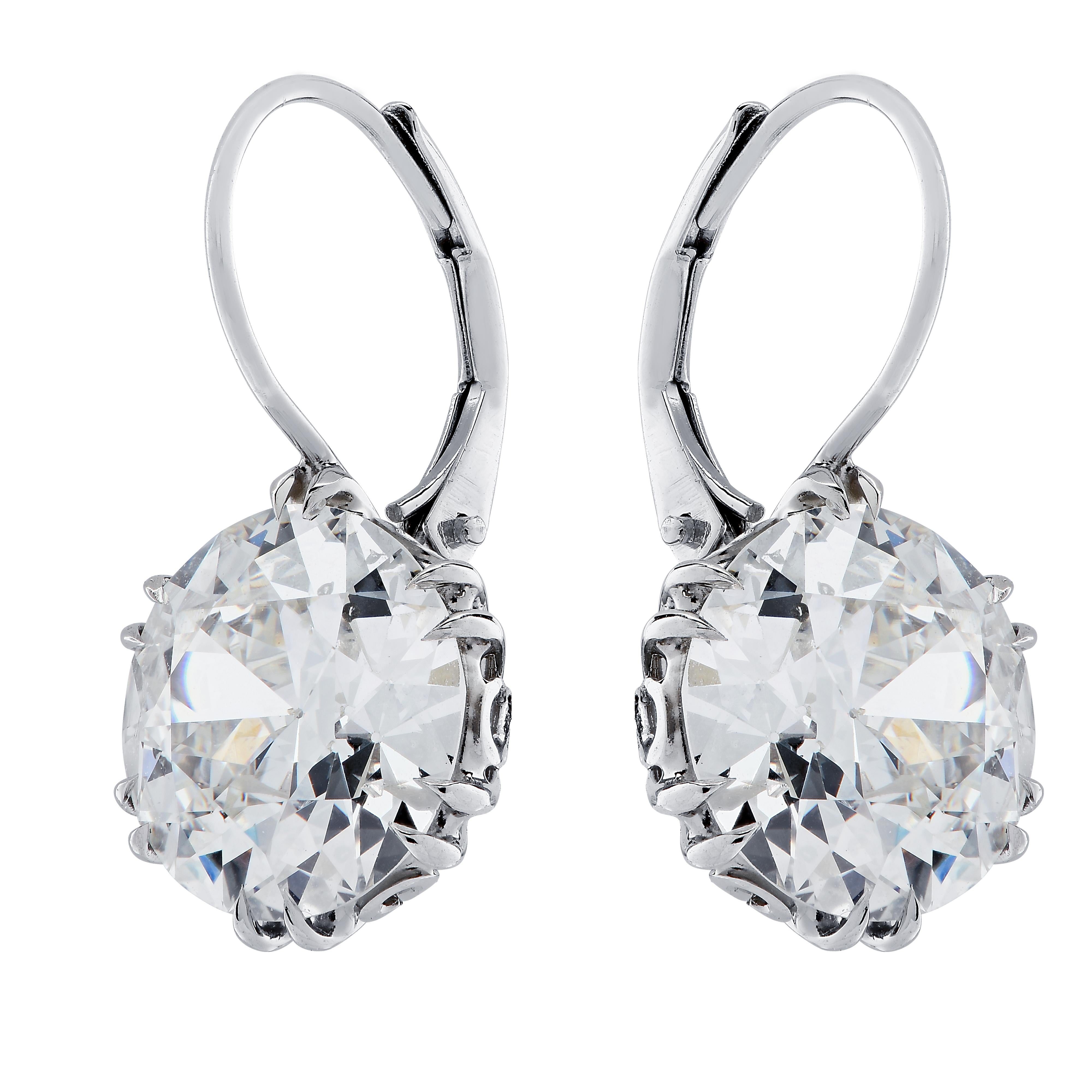 Handmade Platinum earrings featuring 2 Old European cut diamonds weighing 7.83 carats total, F-G color SI clarity. . These stunning earrings measure 20.15 mm in length and 11 mm in width. They weigh 5.9 grams

Our pieces are all accompanied by an