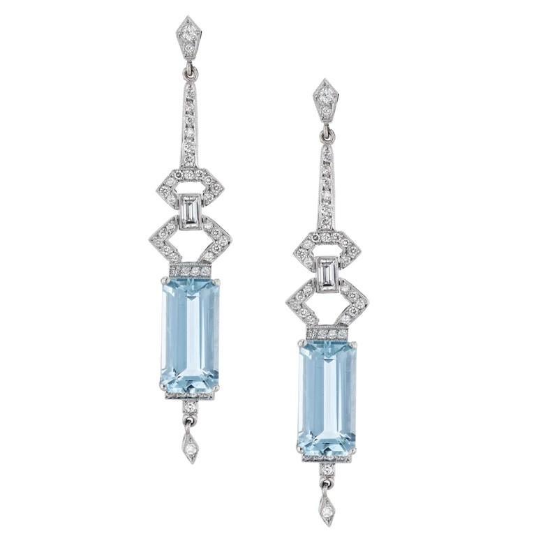 Indulge yourself in the brilliance of these Platinum Diamond Aquamarine Drop Earrings! 

These art-deco inspired beauties feature sparkling Aquamarine and shimmering Diamonds. Handcrafted to perfection, these Earrings are a must-have accessory!

The
