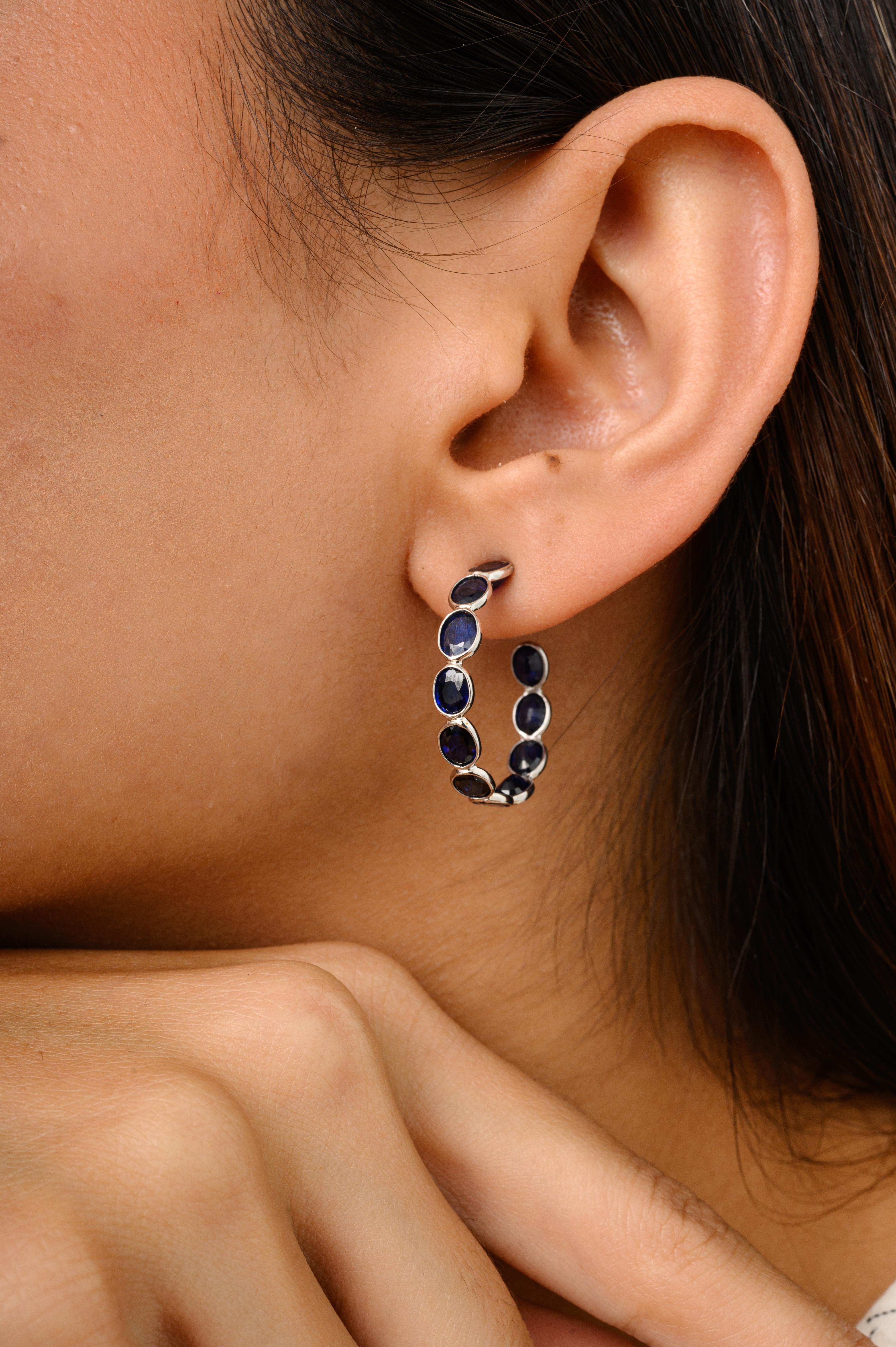 Handmade 9.07 Carat Blue Sapphire Hoop Earrings for Her in 18K Gold to make a statement with your look. You shall need hoop earrings to make a statement with your look. These earrings create a sparkling, luxurious look featuring oval cut blue