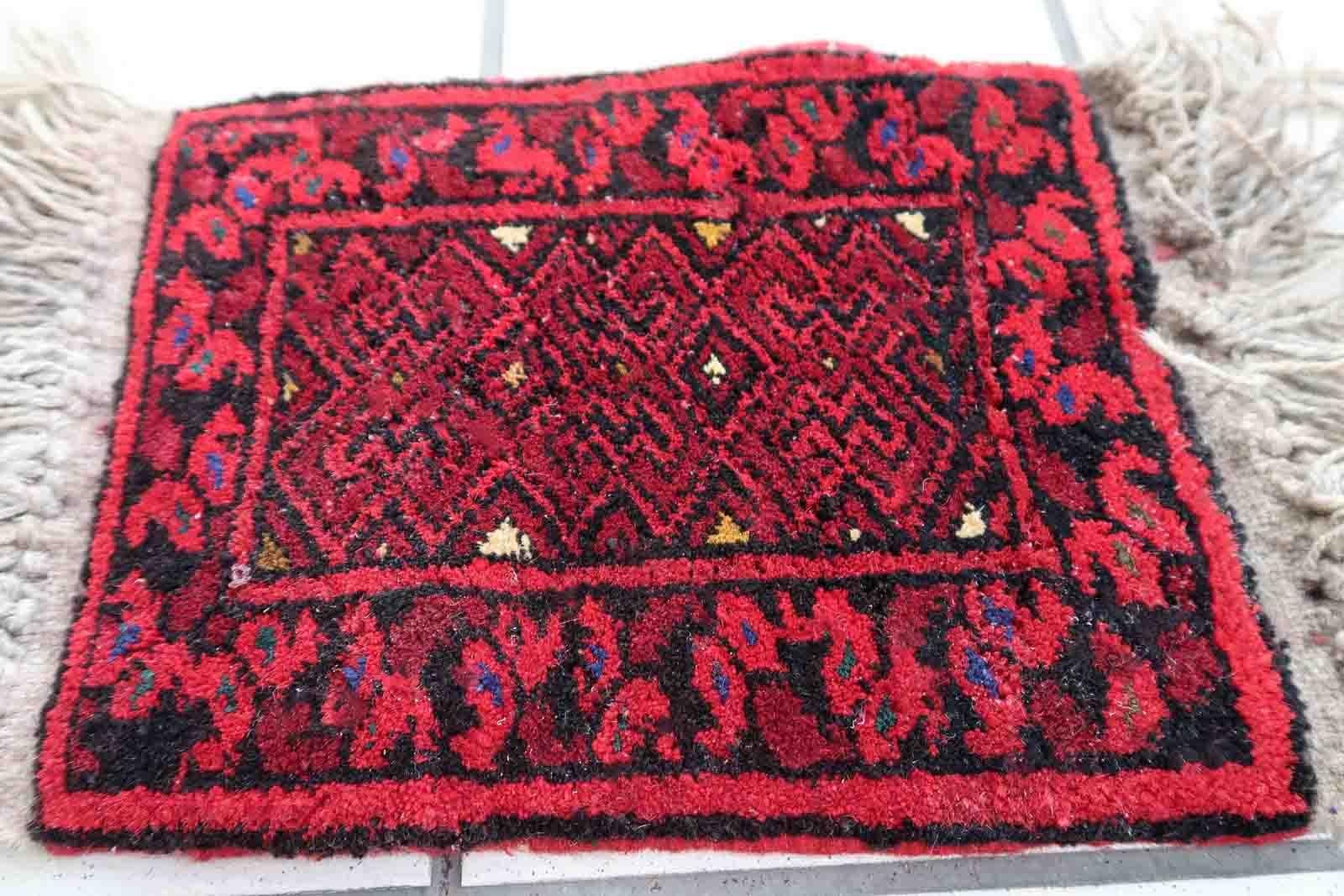 Handmade vintage Afghan Ersari mat in bright red shade. The rug is from the end of 20th century in original good condition. It can be used as a doll house rug.

-condition: original good,

-circa: 1970s,

-size: 0.7' x 0.9' (24cm x