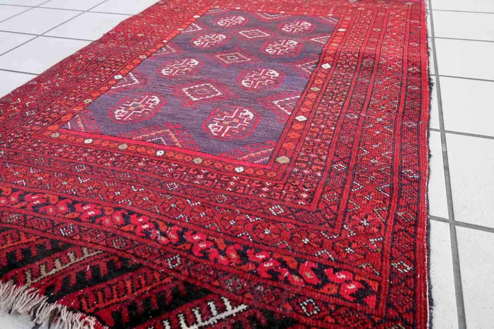 Handmade semi-antique Afghan Ersari rug in traditional design. The rug has been made in wool in the end of 20th century. It is in original condition, has some signs of age.

-condition: original, some signs of age,

-circa: 1950s,

-size: 2.5'