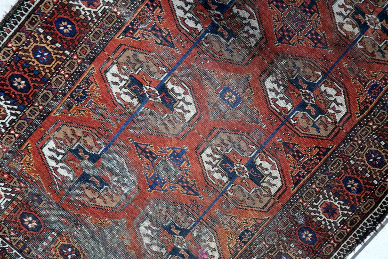 Début du 20ème siècle Tapis de baluchon afghan vintage fait à la main des années 1920, 1C1073 en vente