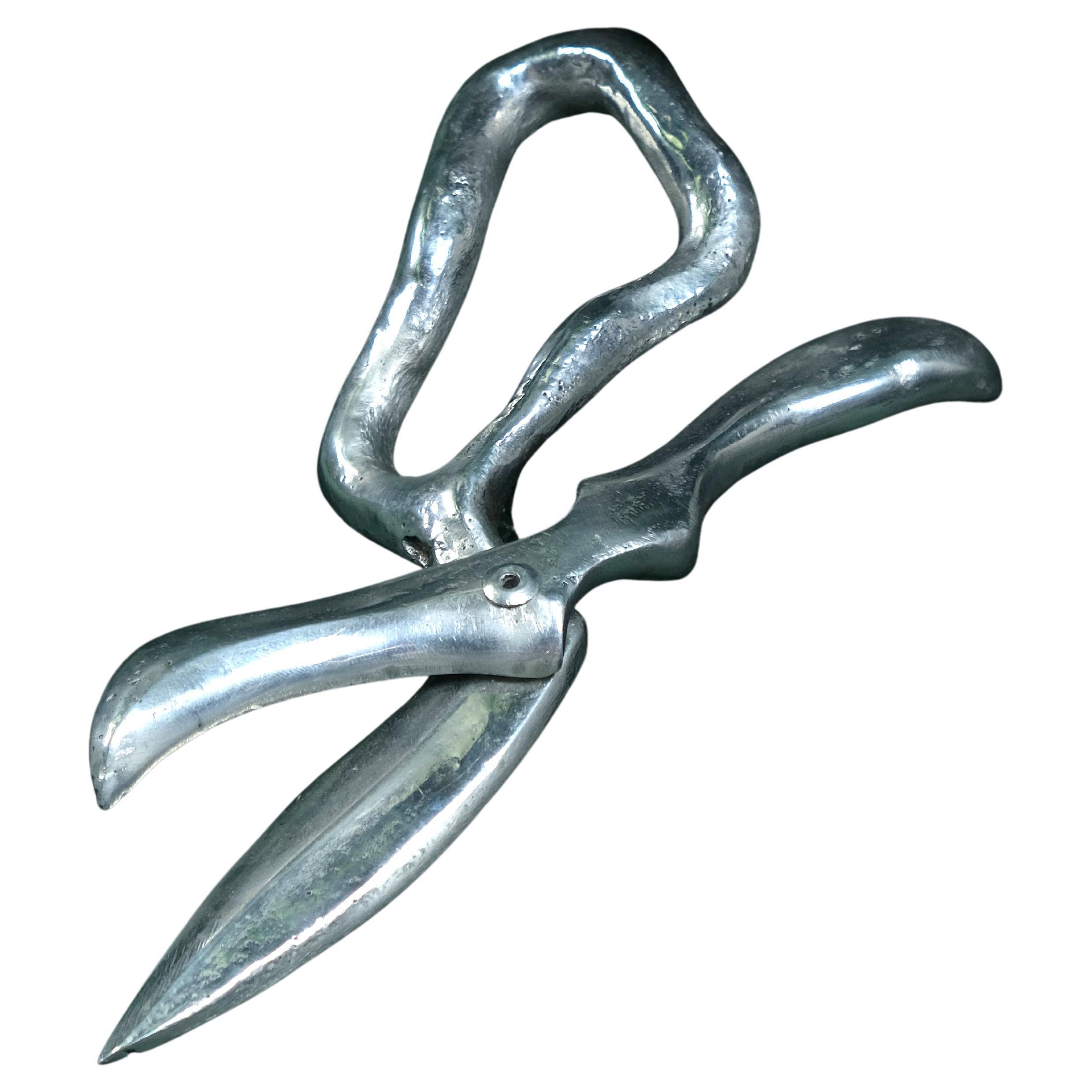 Handmade aluminium cast sculpture of scissors by Olga Flór