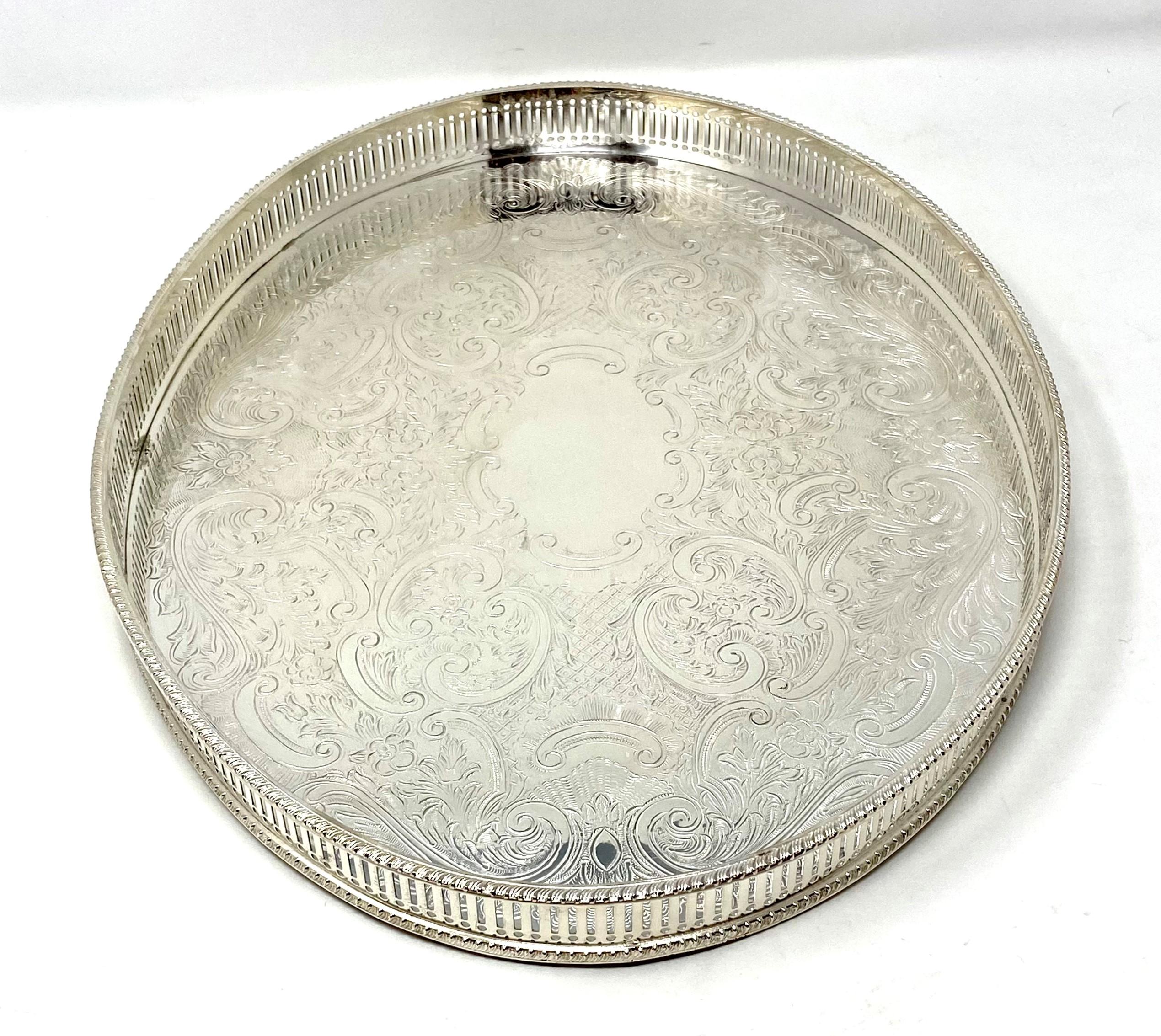 Finely engraved handmade English silver plated footed oval tray with gallery.