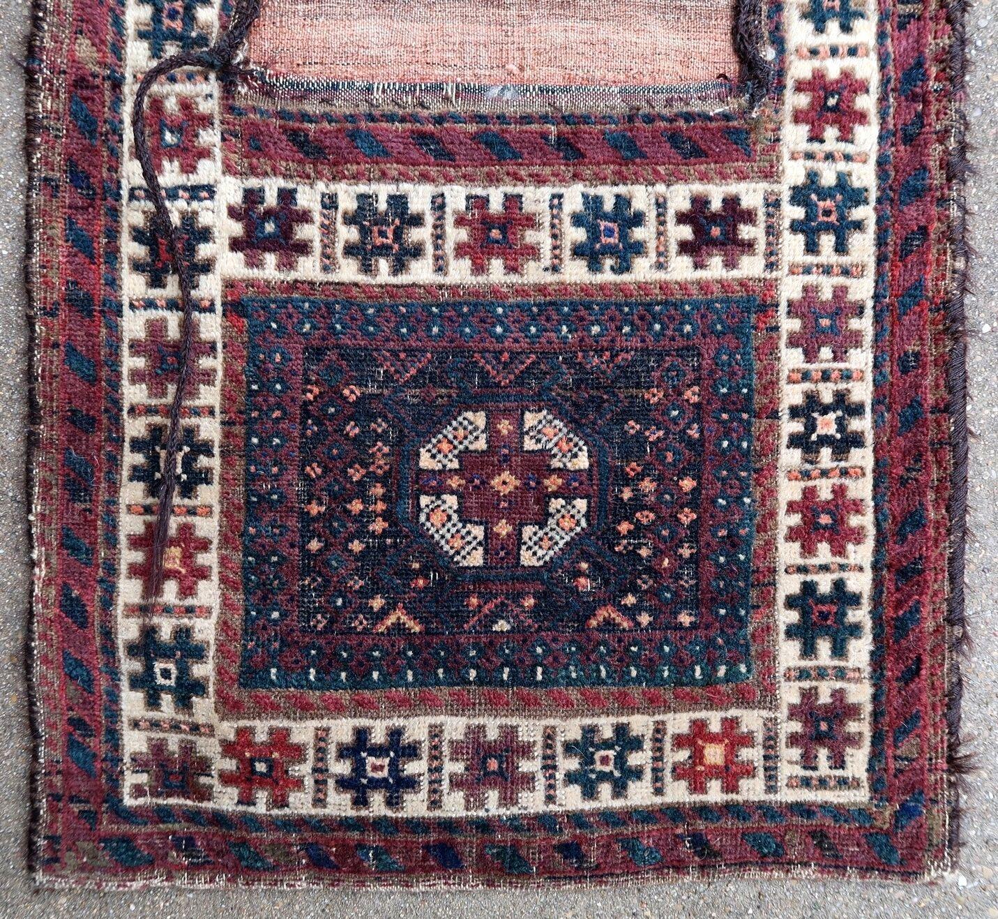 Handmade antique Baluch bag from Afghanistan in original condition, it has age wear. The rug is from the beginning of 20th century.

?-condition: original, age wear,

-circa: 1900s,

-size: 1.5' x 3.2' (47cm x 98cm),

-material: