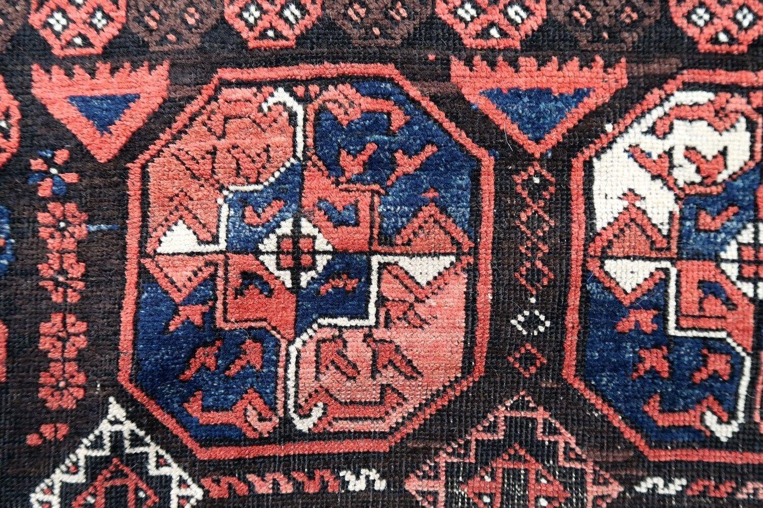 Handmade antique Baluch rug from Afghanistan in original condition, it has some signs of age. The rug is from the beginning of the 20th century.

- Condition: original, some signs of age,

- circa 1900s,

- Size: 3.3' x 5.8' (101cm x