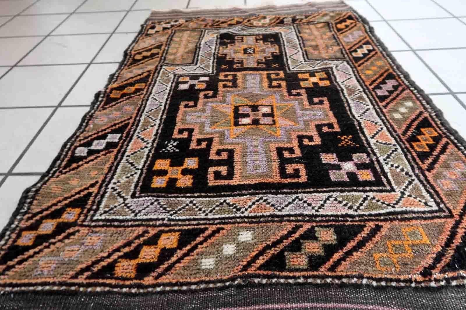 Handmade antique collectible Afghan Baluch rug in tribal prayer design. The rug is from the middle of 20th century in original good condition.

-condition: original good,

-circa: 1900s,

-size: 2.1' x 3.4' (66cm x 104cm),

-material: