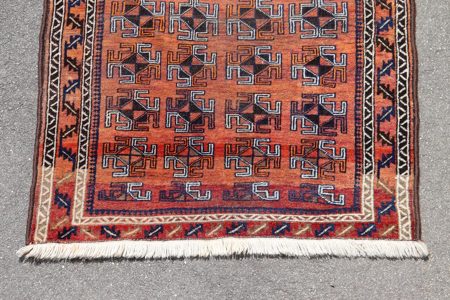 Beautiful old manufacture ( 1930s circa)  Afghan Baluch rug in unusual tribal design with combination of colors: red, white, black. This fantastic rug handmade in wool. Used conditions.
   