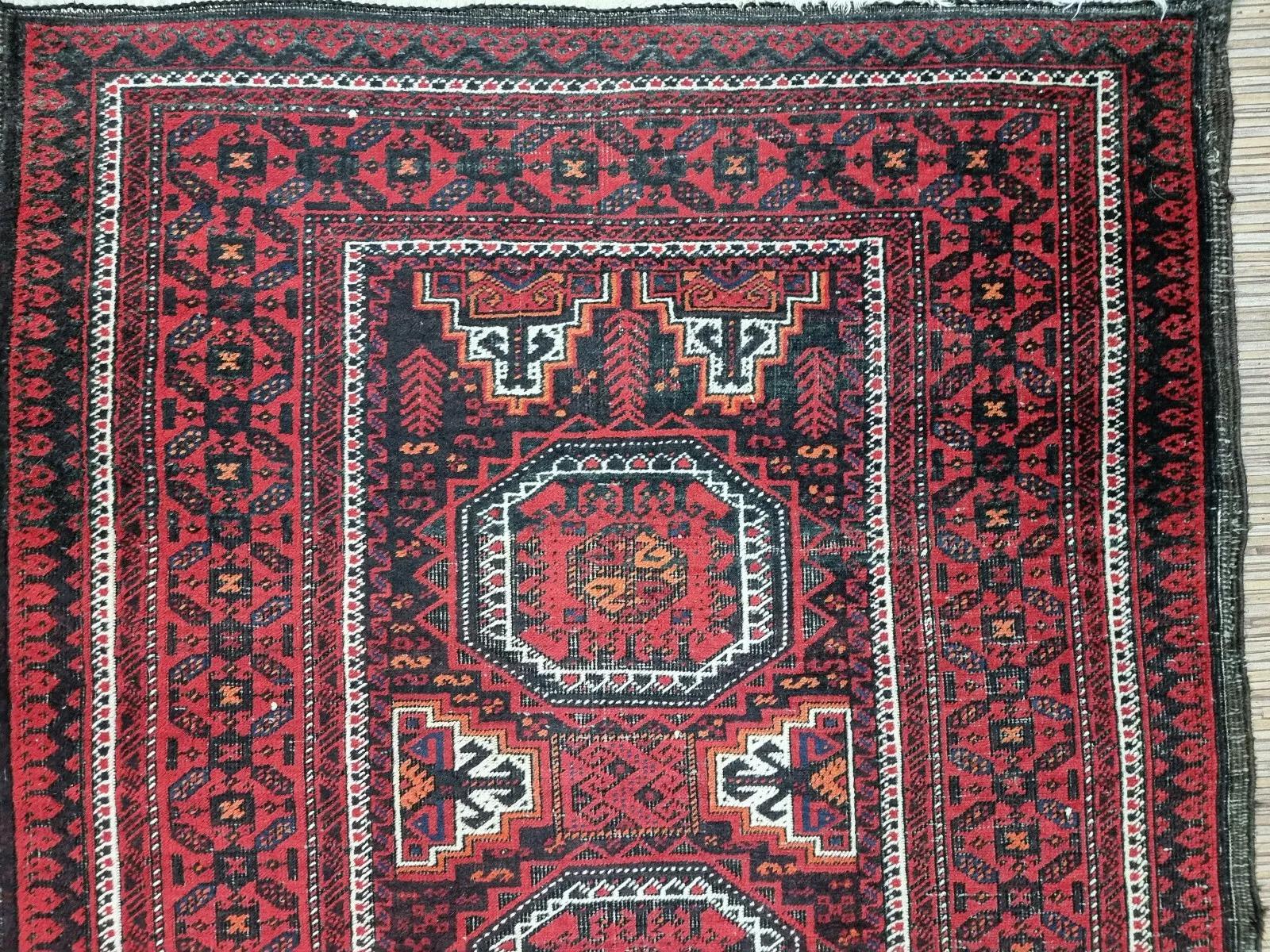This exquisite handmade Baluch rug from the 1930s showcases the rich textile traditions of Afghanistan. Featuring an intricate Oriental design in deep red tones, it adds warmth and character to any space.

Features & Details:
Origin: Baluch,