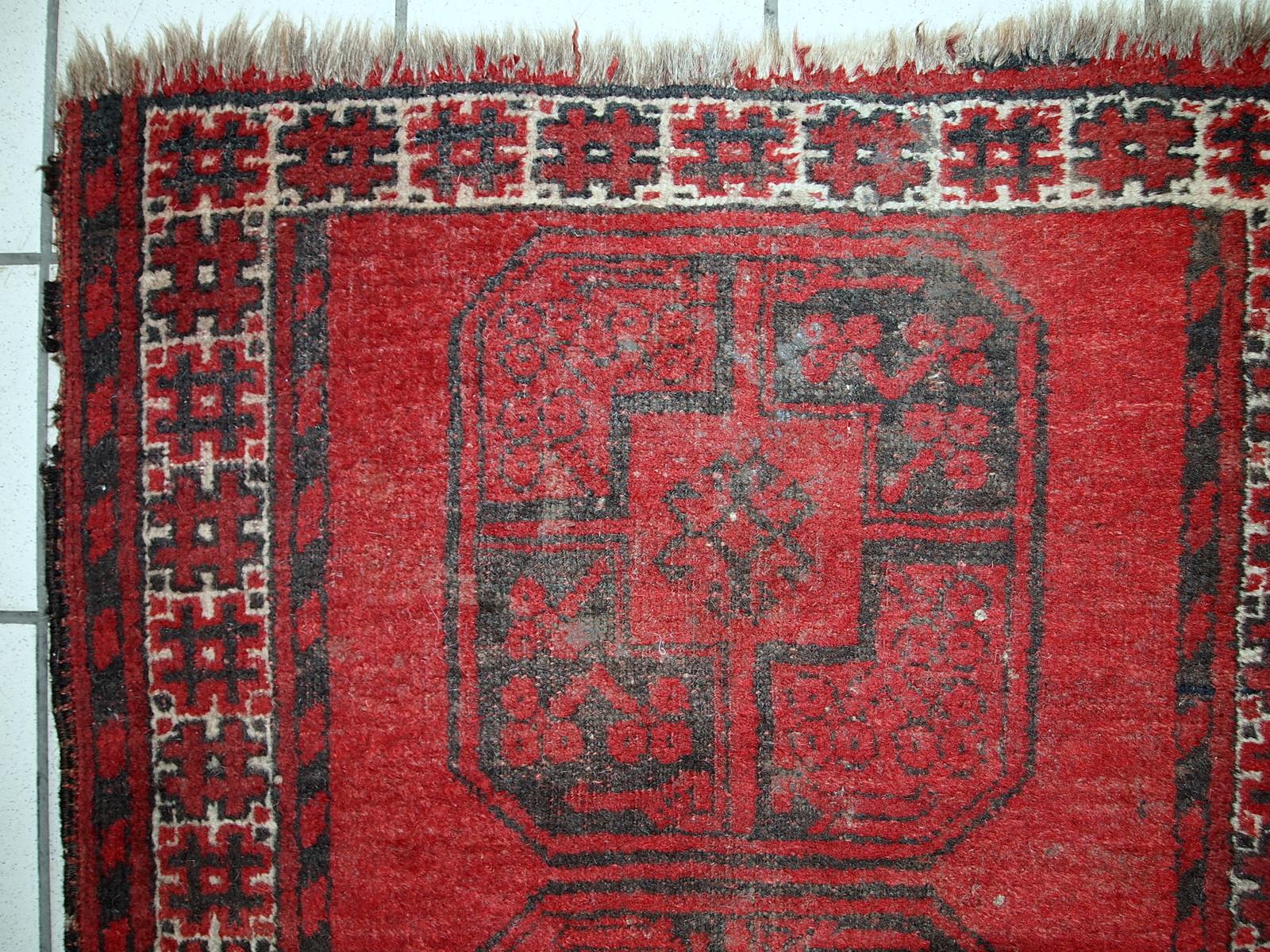 Handmade antique Afghan Ersari rug from the beginning of 20th century. This rug made in bright red wool.

Condition: original, some signs of age,

circa 1900s,

Size: 2.4' x 3' (75cm x 92cm),

Material: wool,

Country of origin: Middle