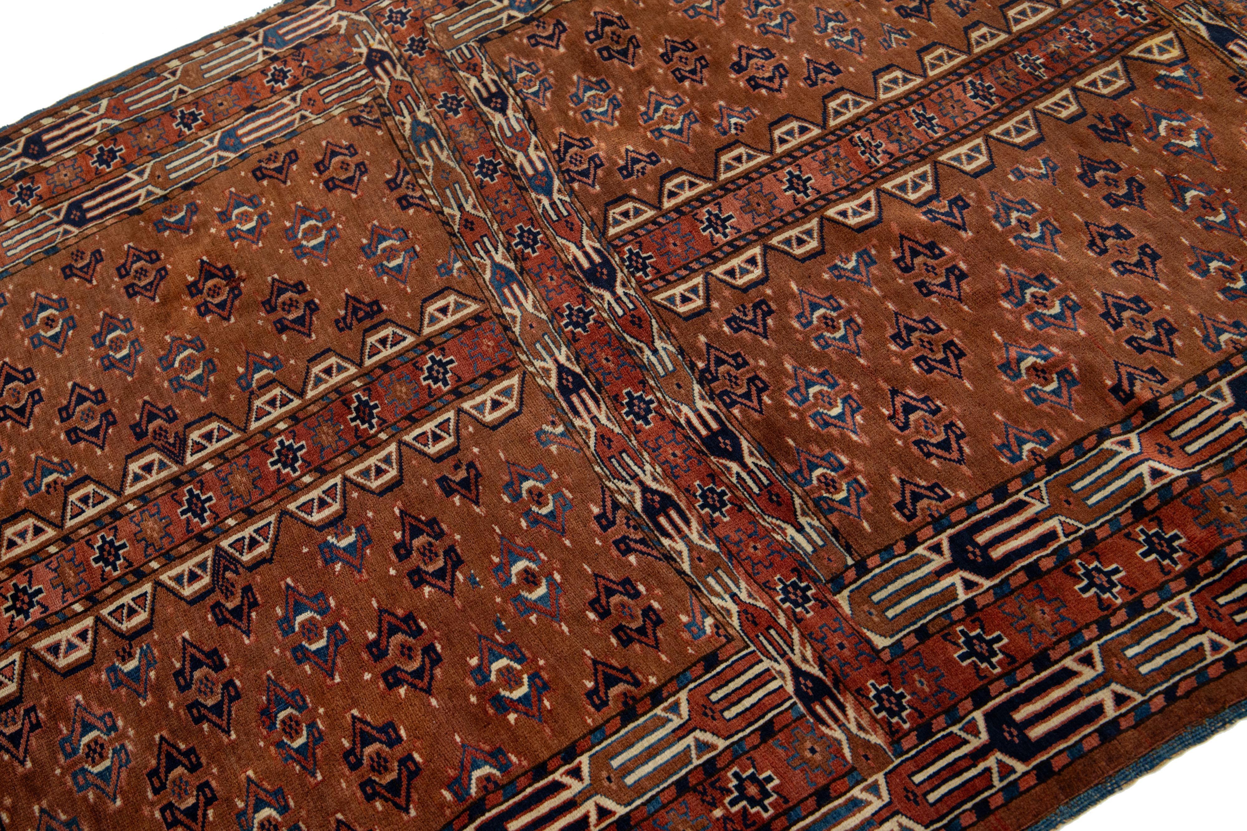 Islamic Handmade Antique Afghan Yamoud Wool Rug In Brown With Allover Pattern  For Sale