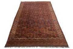 Handmade Antique Afghan Yamoud Wool Rug In Rust With Allover Design