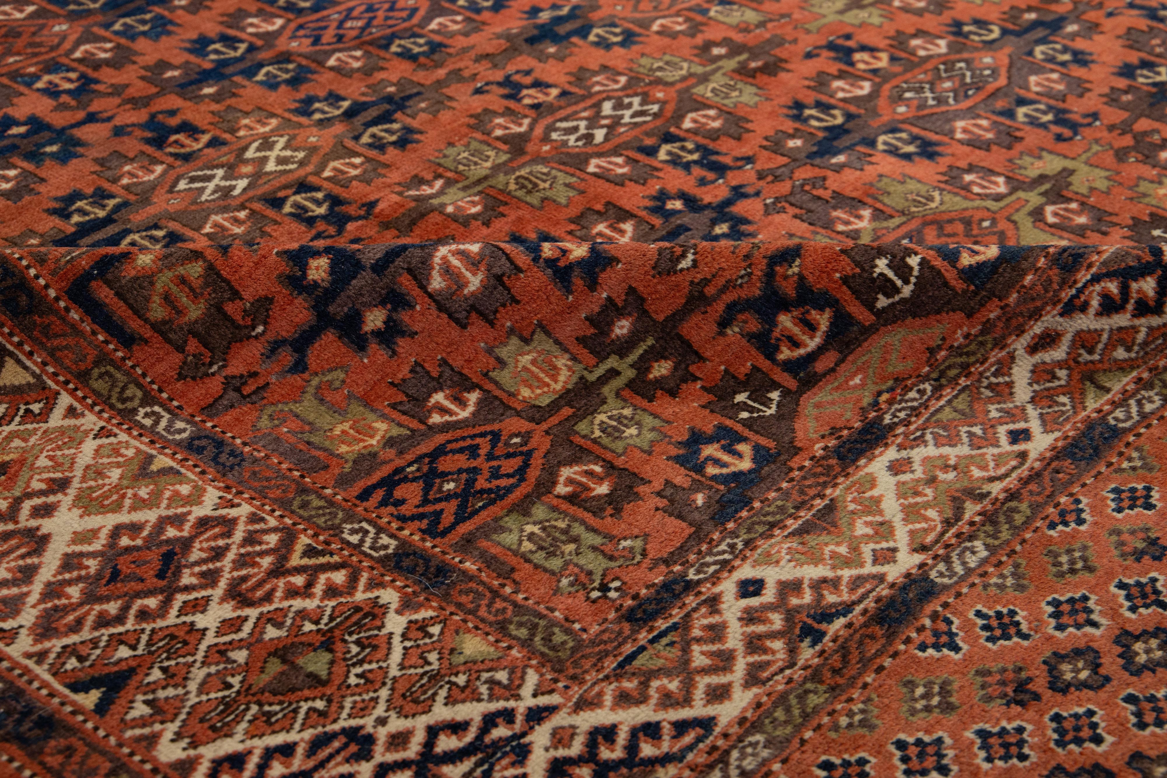 Islamique Tapis afghan Yamoud ancien fait à la main en laine rouillée avec motif sur toute sa surface en vente