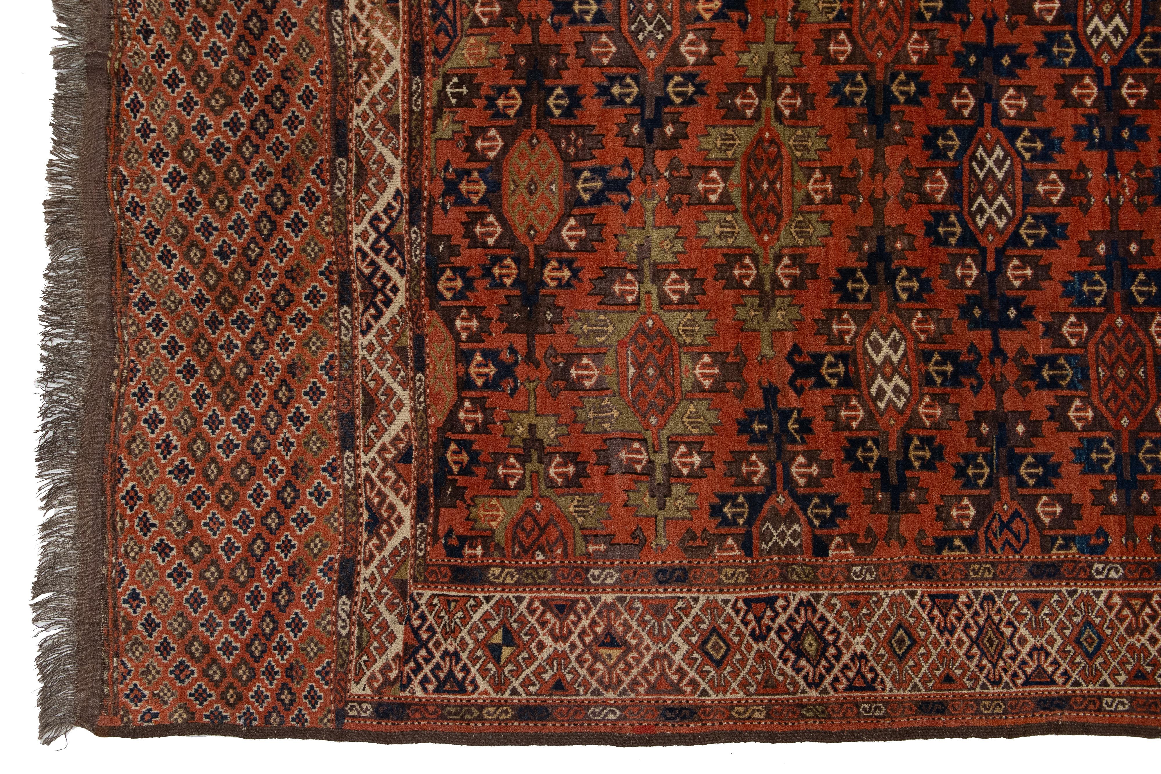 Début du 20ème siècle Tapis afghan Yamoud ancien fait à la main en laine rouillée avec motif sur toute sa surface en vente