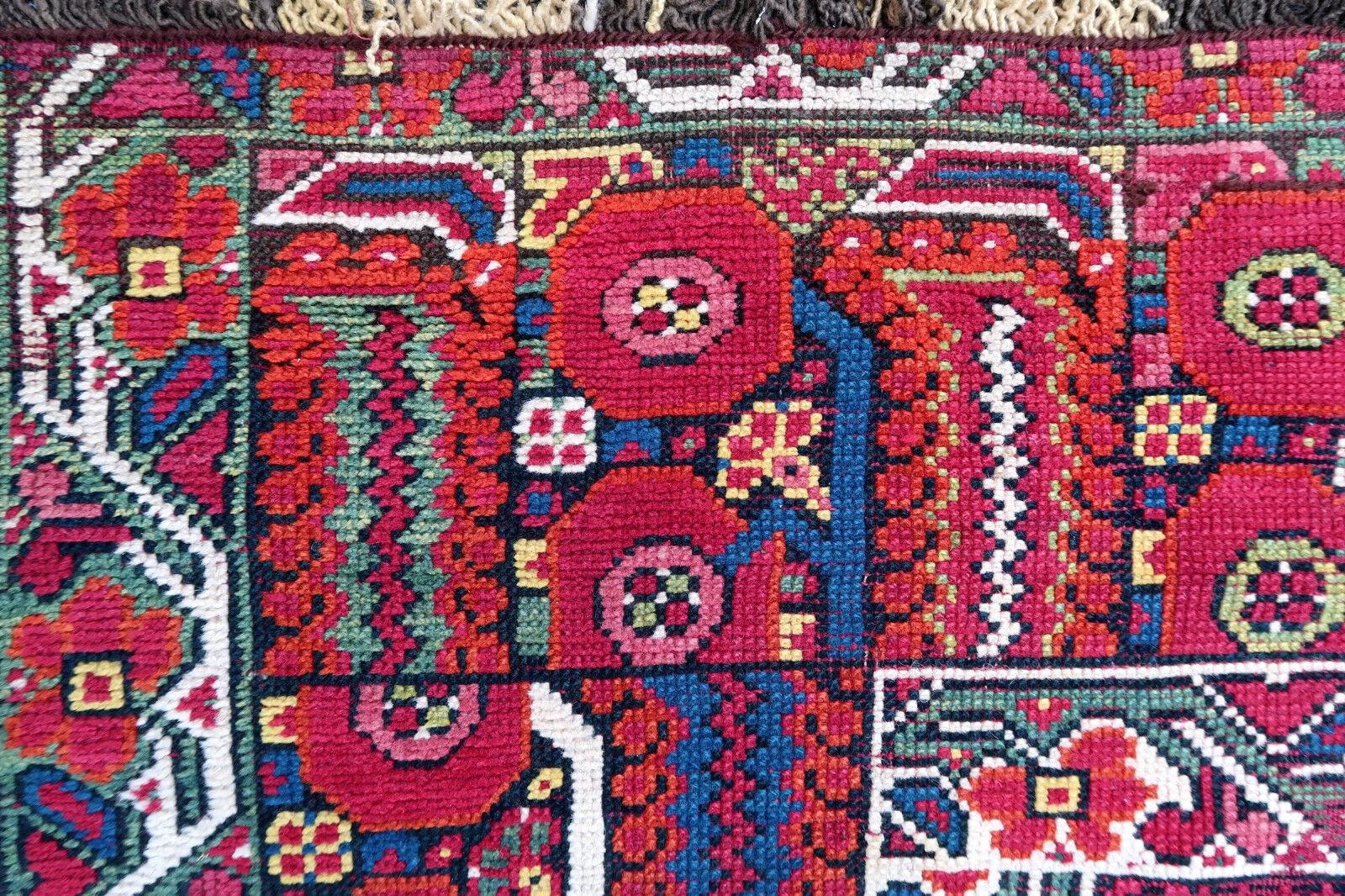 Handmade antique Algerian Berber rug in original condition, it has some signs of age and old restorations. This rug is from the beginning of 19th century made in crimson wool and tribal design.

- Condition: some signs of age, old